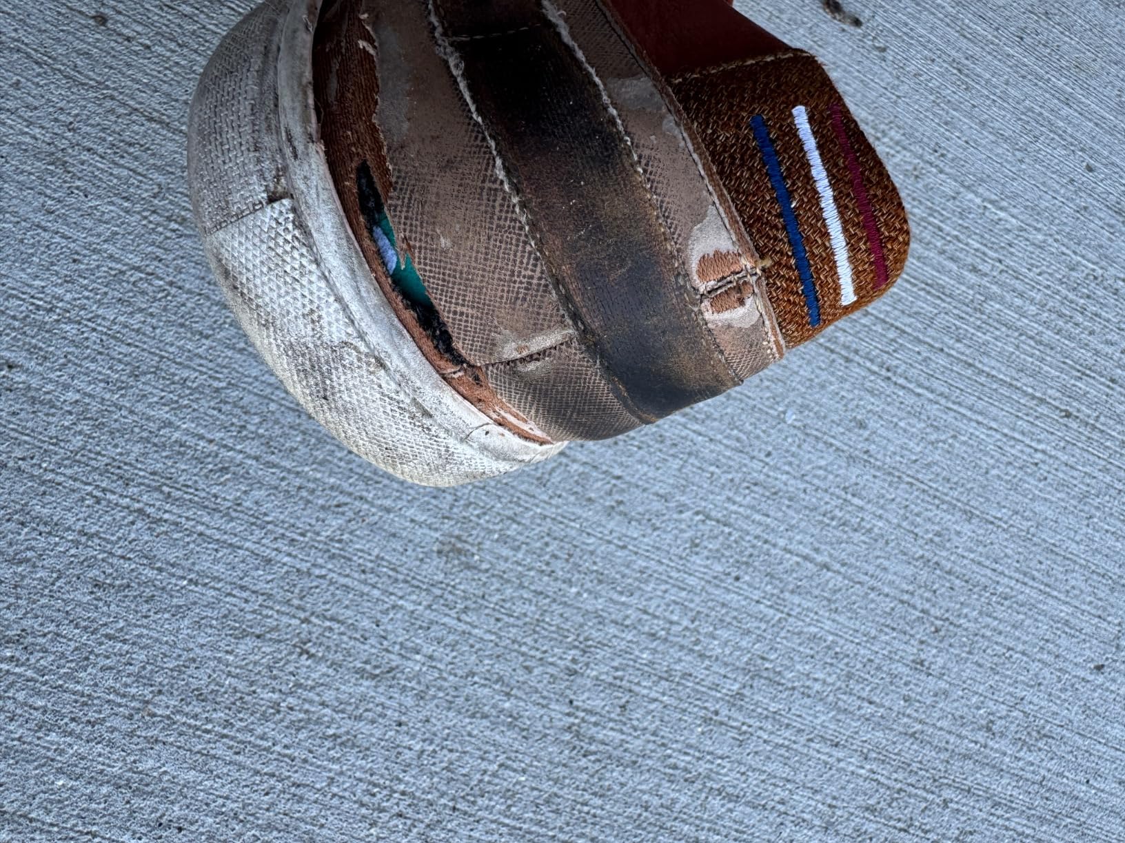 Inside view of Bruno Marc sneaker showing latex insole and interior construction details