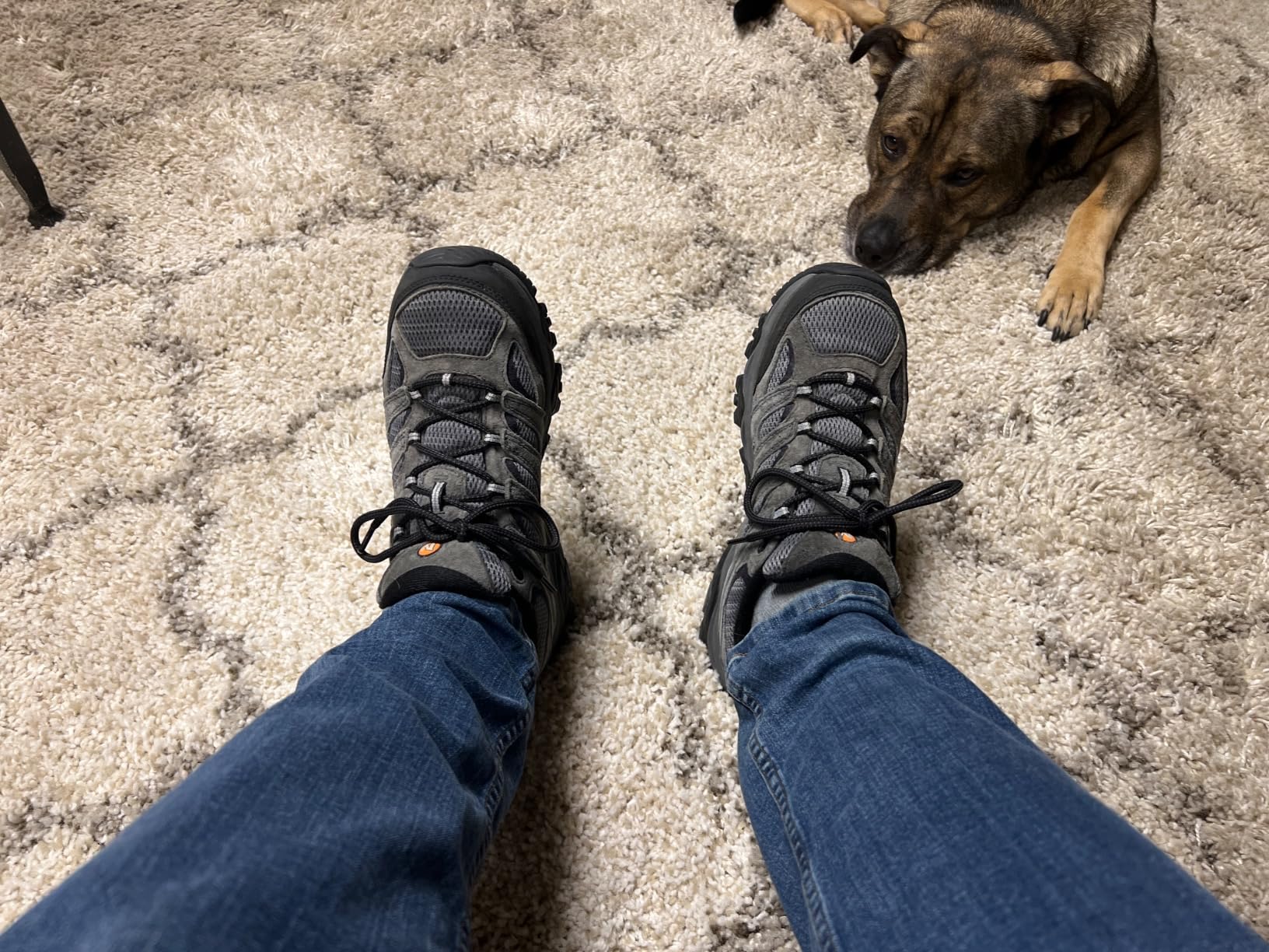 Merrell Moab 3 waterproof hiking shoes being tested in wet conditions and muddy terrain