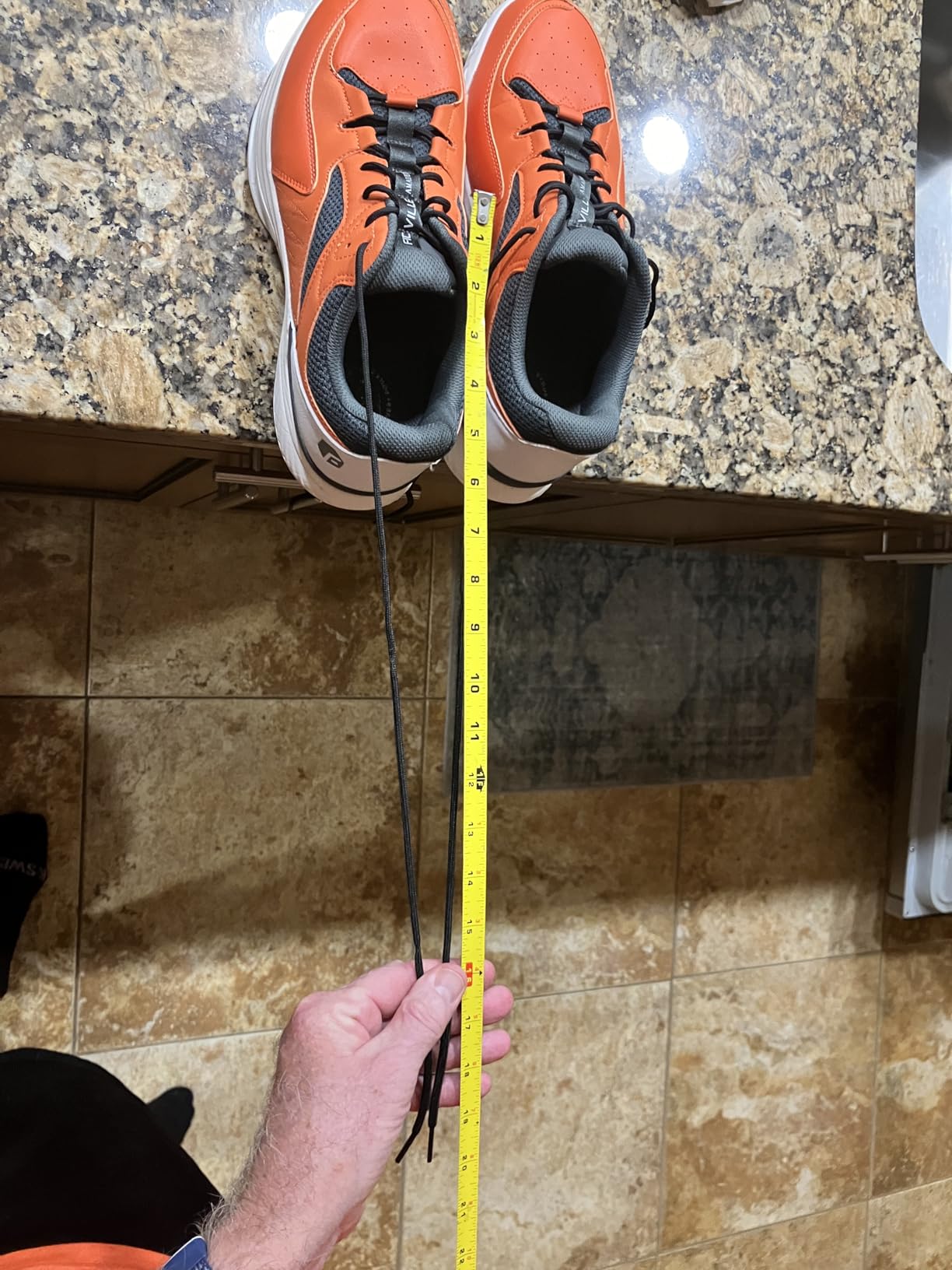 FitVille shoe with extremely long shoelaces demonstrating the excessive length compared to normal lacing