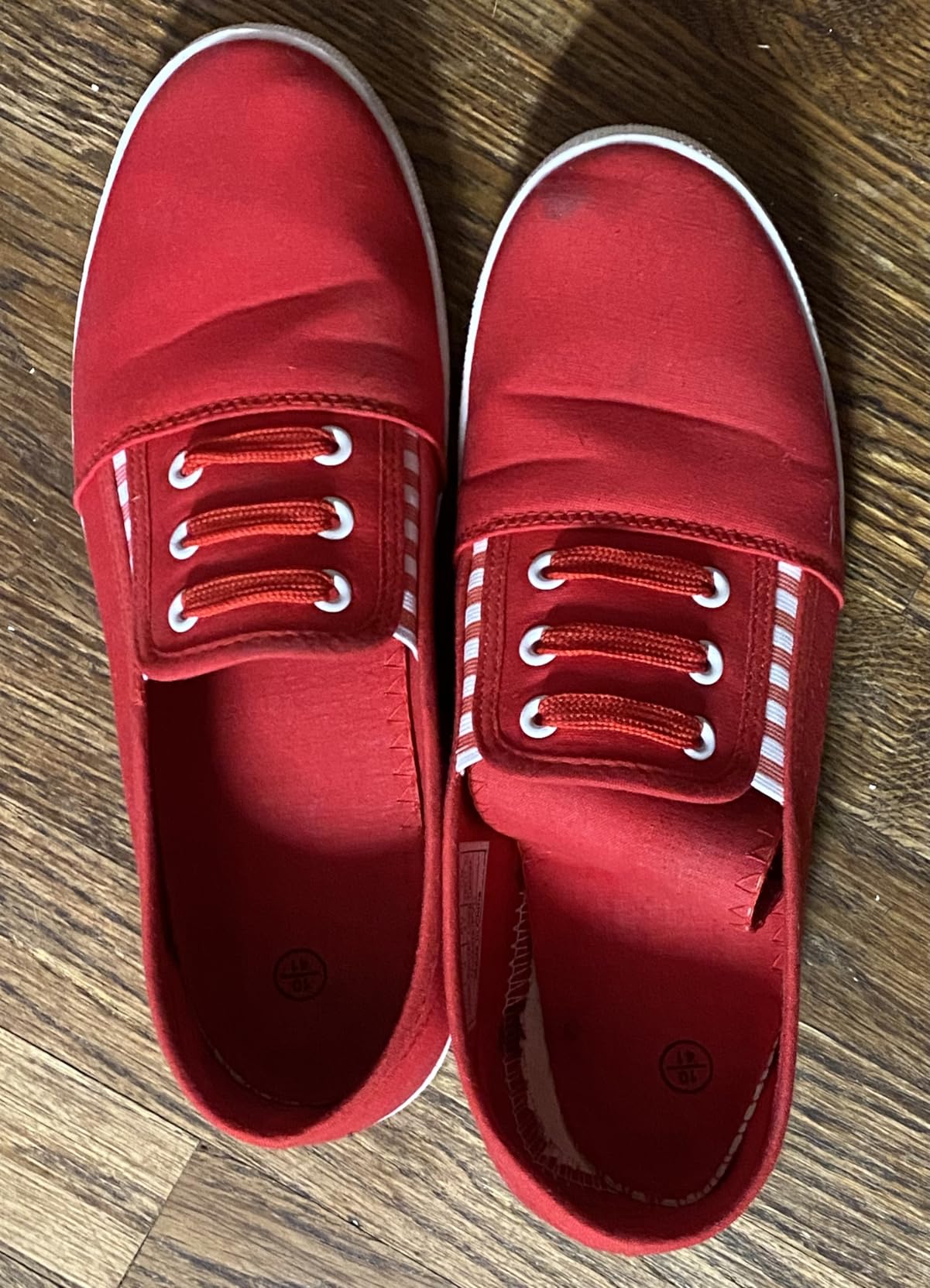 Inside view of Kufeiti slip-on showing insole construction and potential durability concerns
