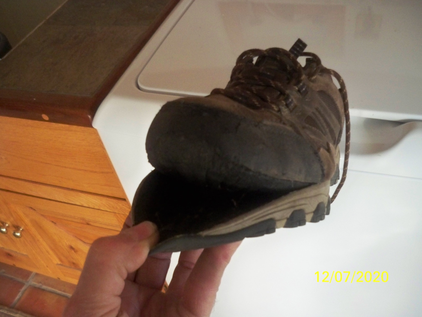 Close-up of Skechers Selmen-Enago showing leather and synthetic upper construction with waterproof treatment
