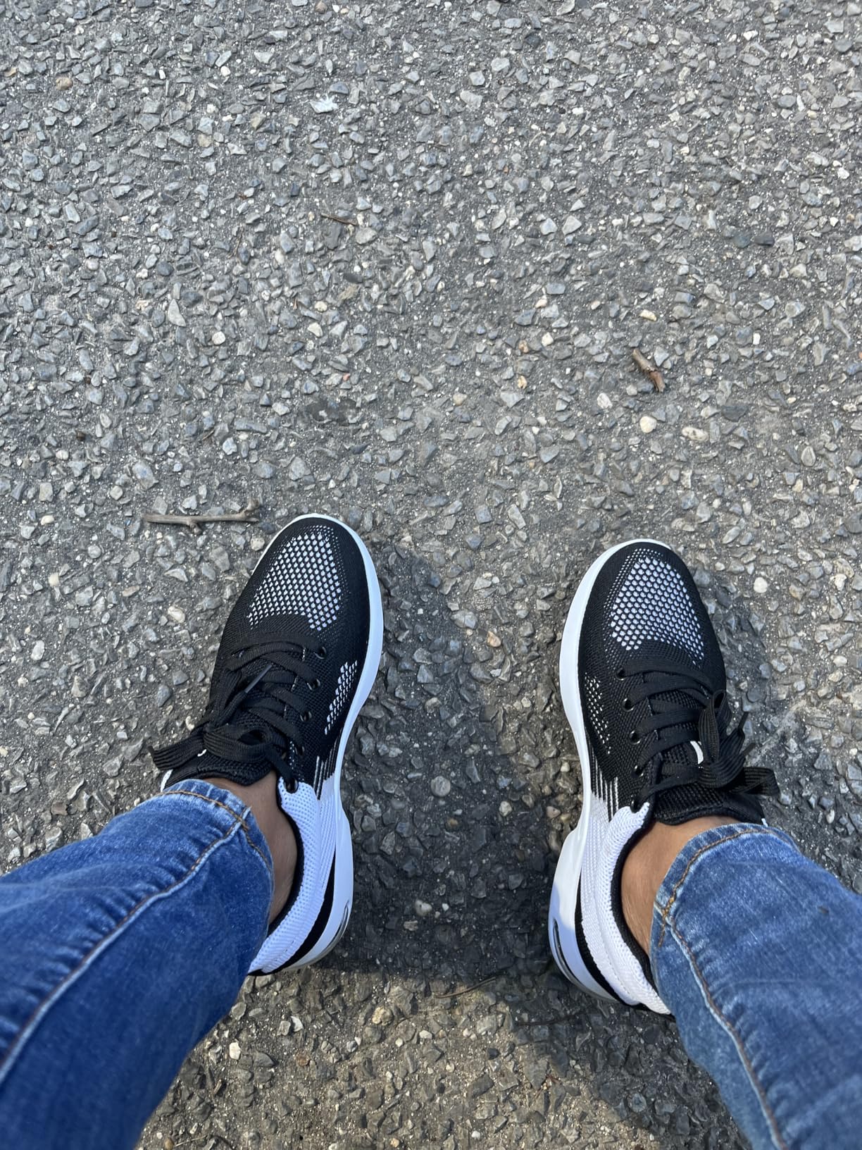 Bottom sole view of Padgene sneakers showing EVA foam and rubber traction pattern
