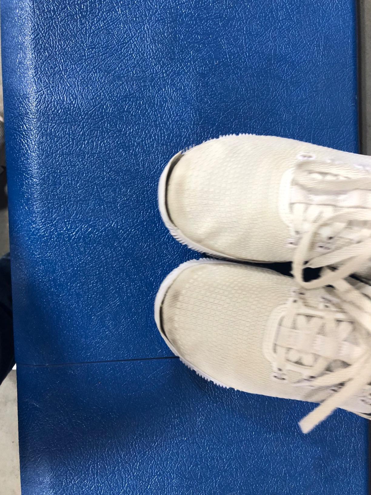 Detailed view of sole separation issue showing durability concerns with intensive volleyball use
