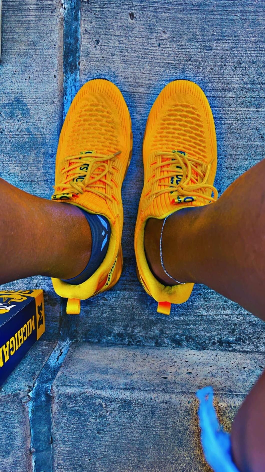 SKDOIUL shoes worn at sporting event showing real-world usage and color appeal