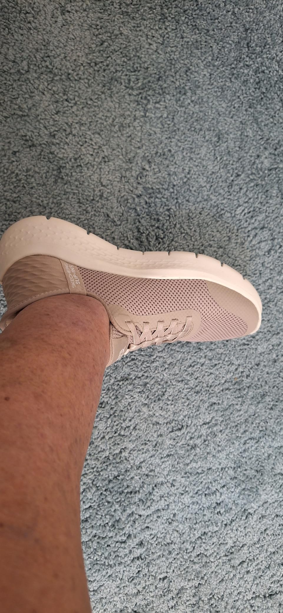 Skechers Go Walk Flex side view showing mesh upper construction and slip-in heel design