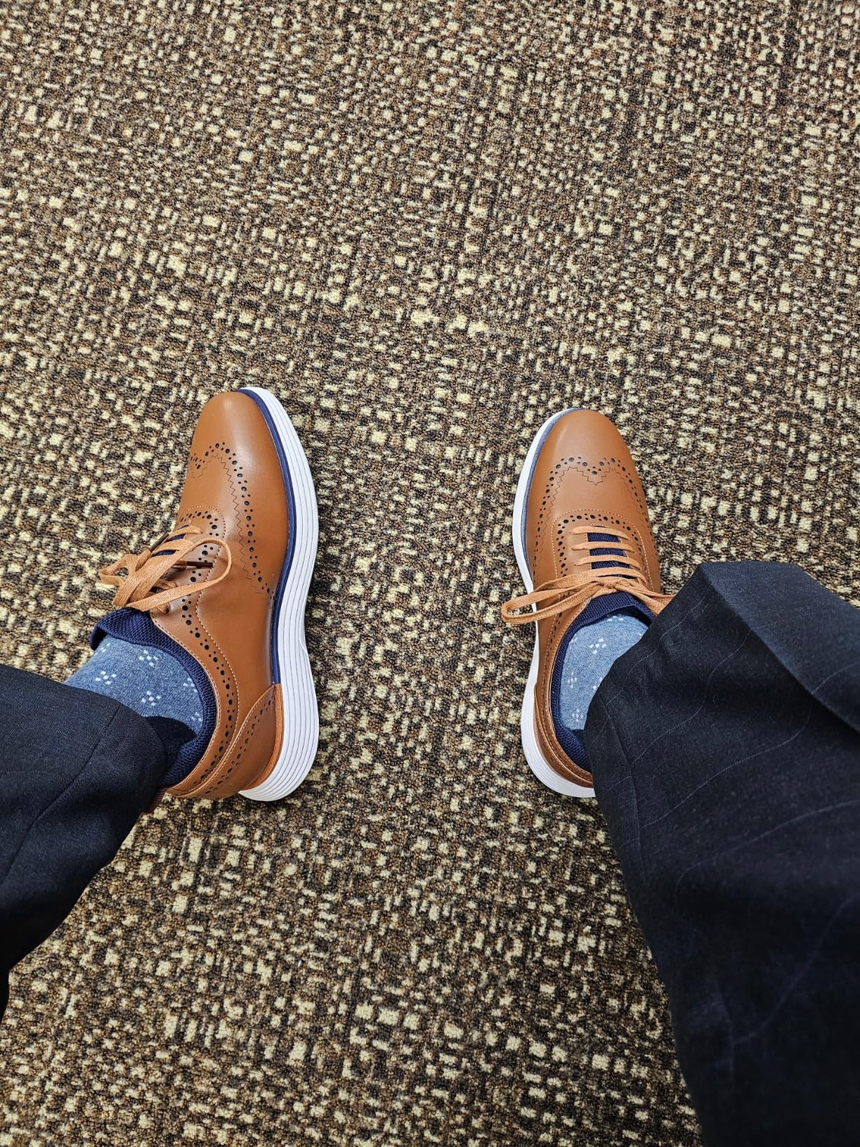 Bruno Marc dress sneaker worn in professional office environment