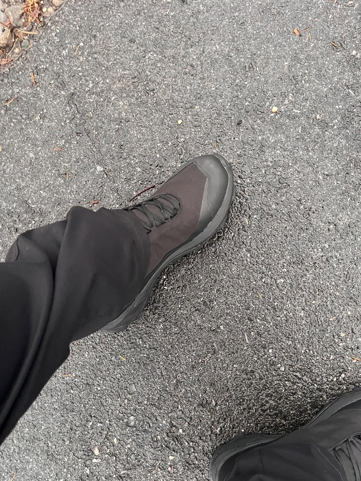 HUMTTO boots in action on rocky terrain showing traction and ankle support performance