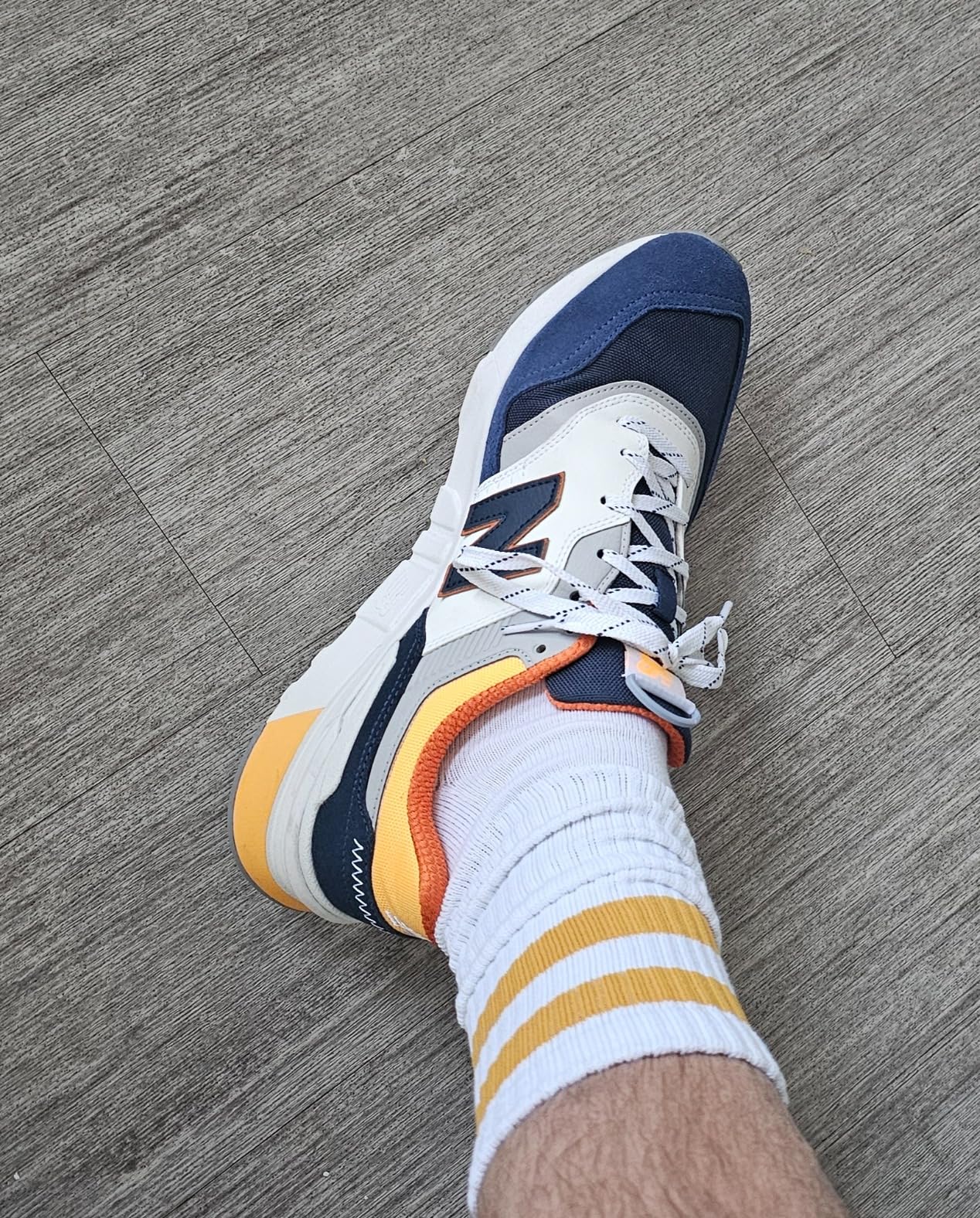 New Balance 997H branding and heritage design elements