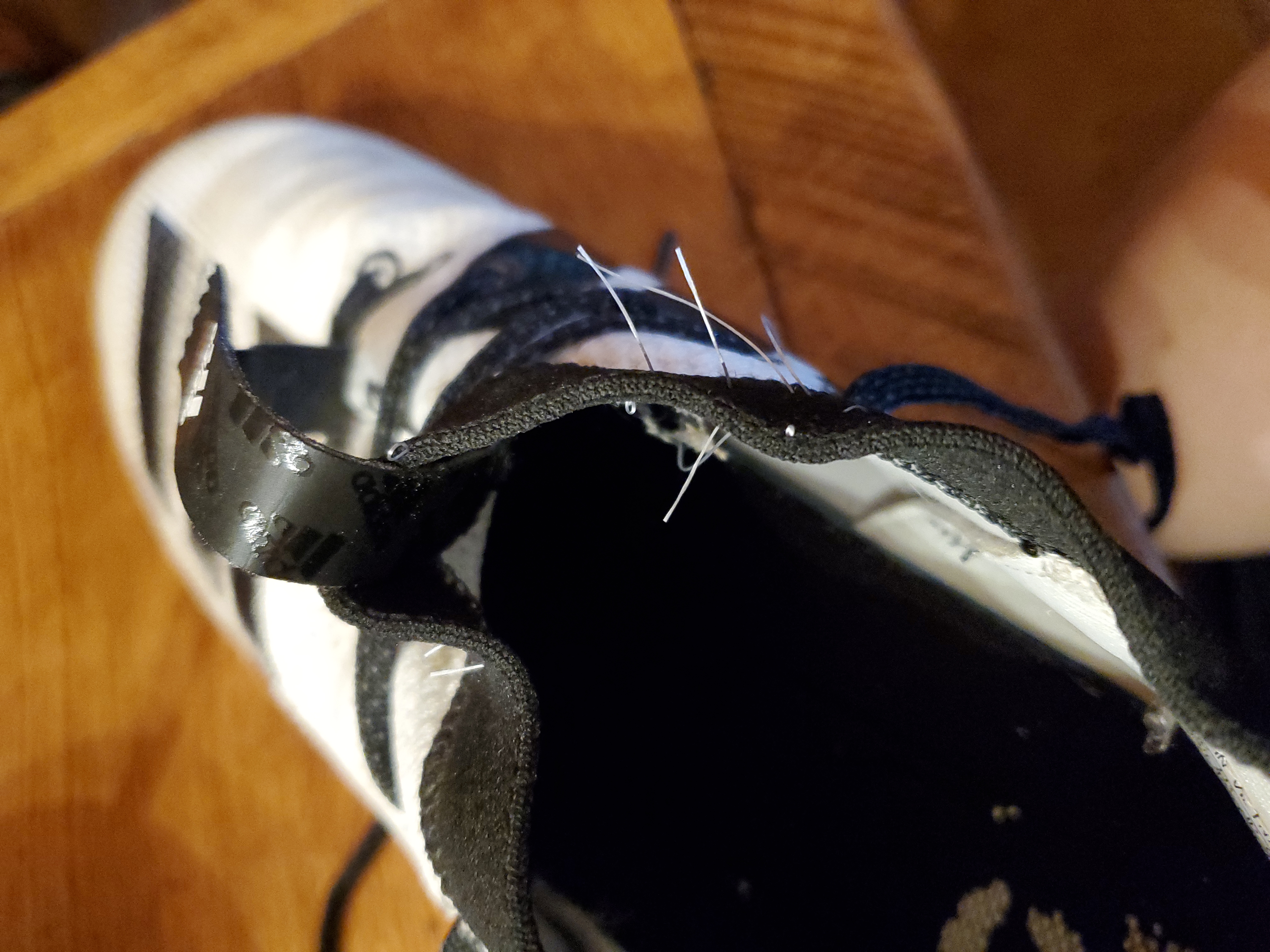Final product shot of Adidas Adizero Scorch football cleats with performance summary