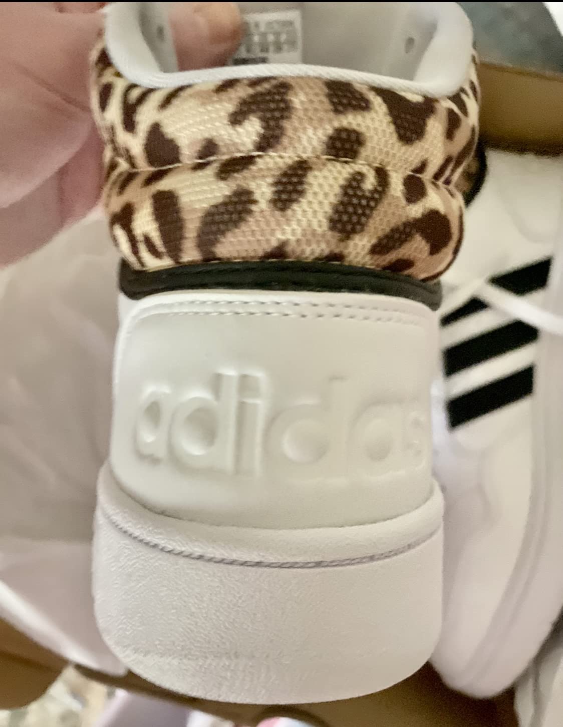Adidas Hoops 3.0 Mid comparison showing different colorways and design details
