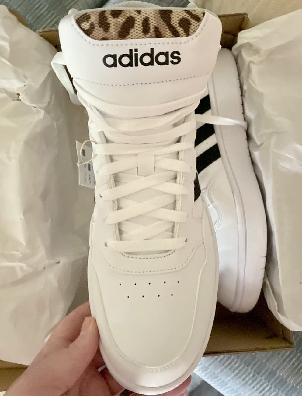 Multiple views of Adidas Hoops 3.0 Mid showing different angles and details