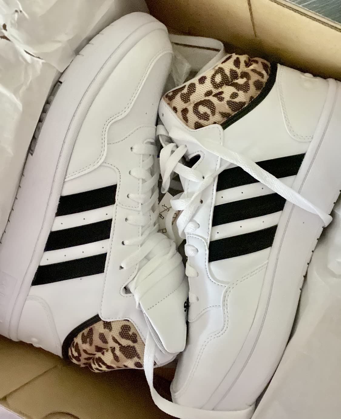 Adidas Hoops 3.0 Mid lifestyle shot showing versatility and style