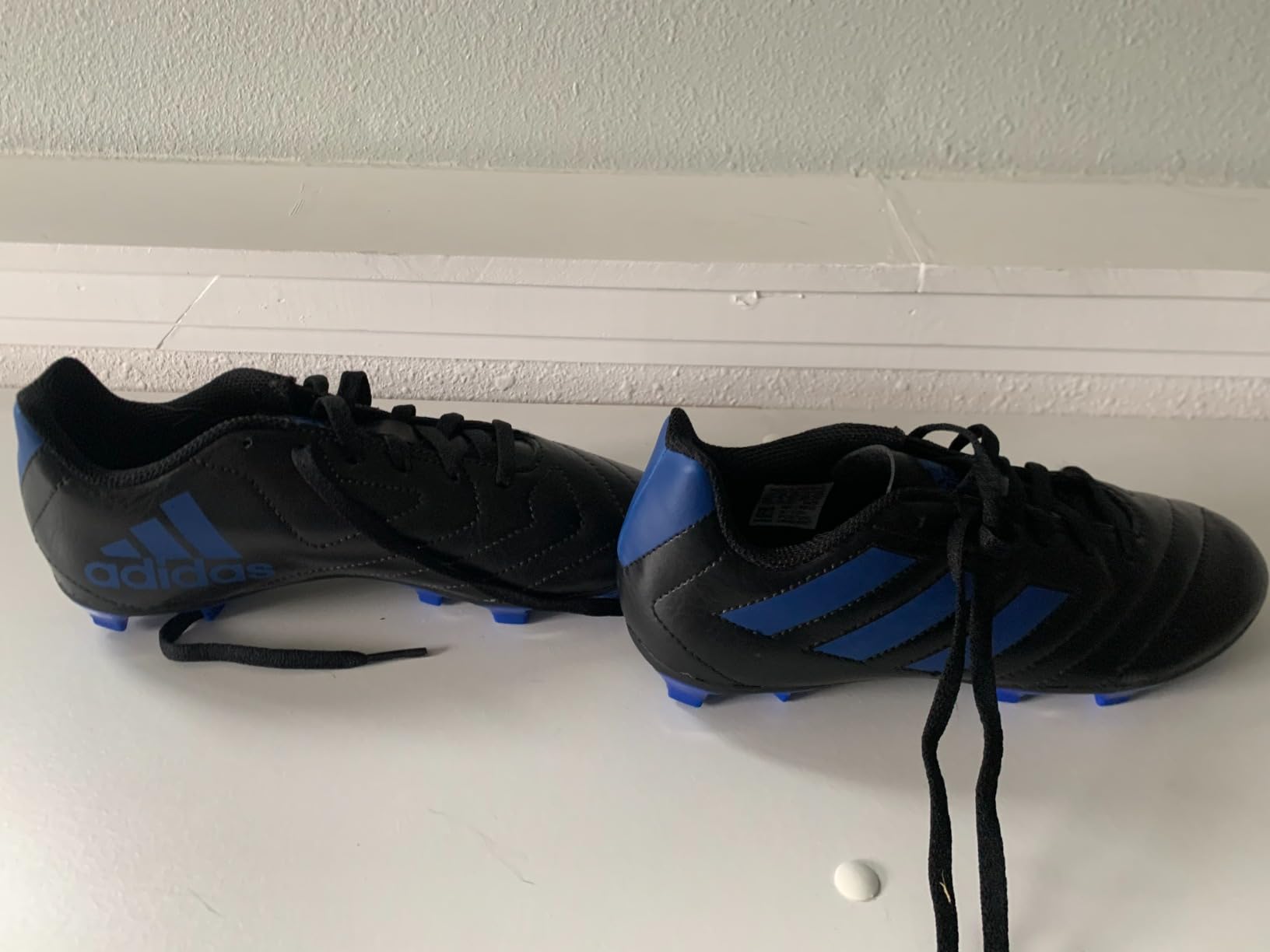 Final assessment of Adidas Goletto VII kids soccer cleats showing overall rating components