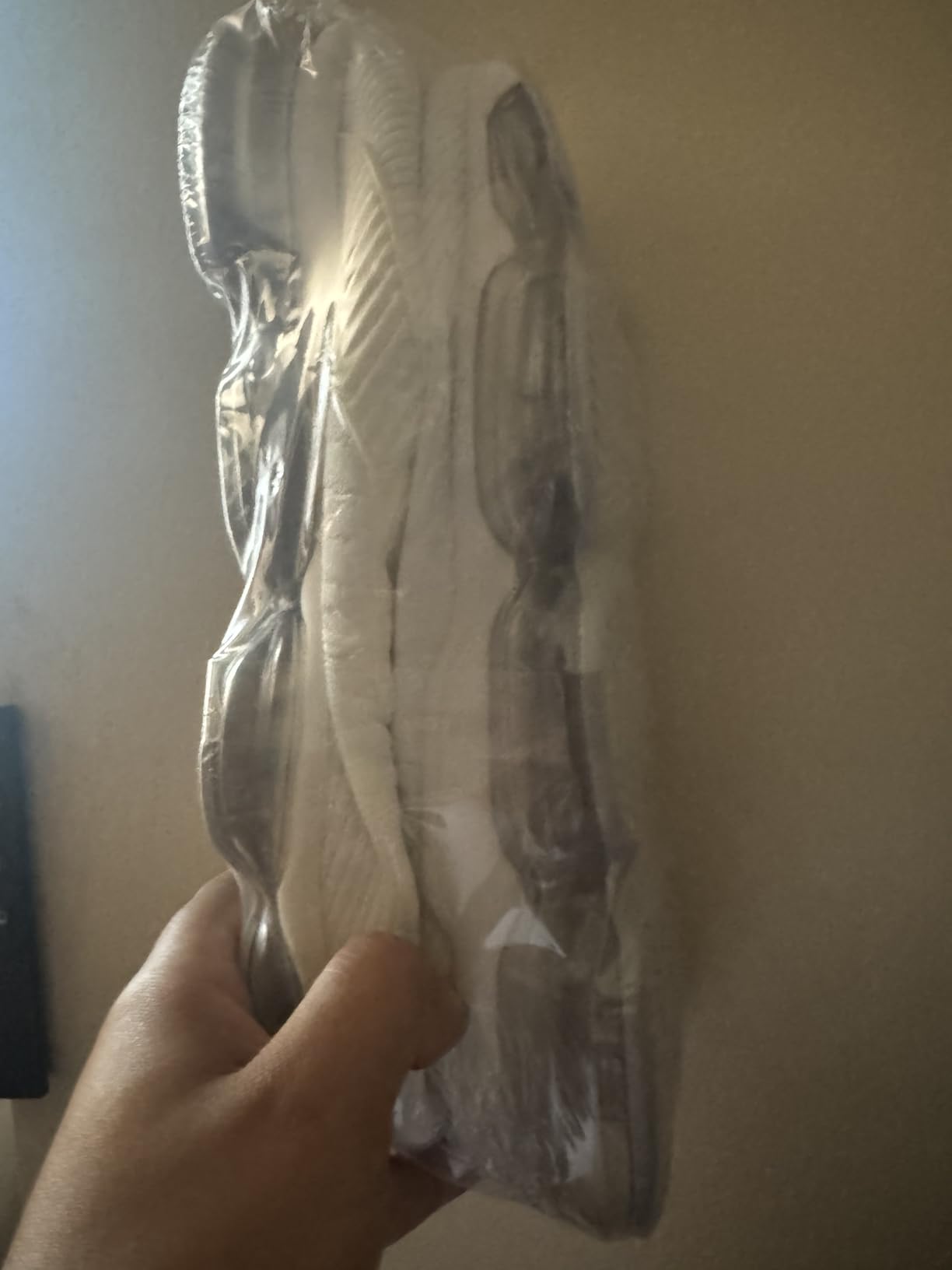 Men's Air Running Shoes showing wrinkled upper material and construction quality issues