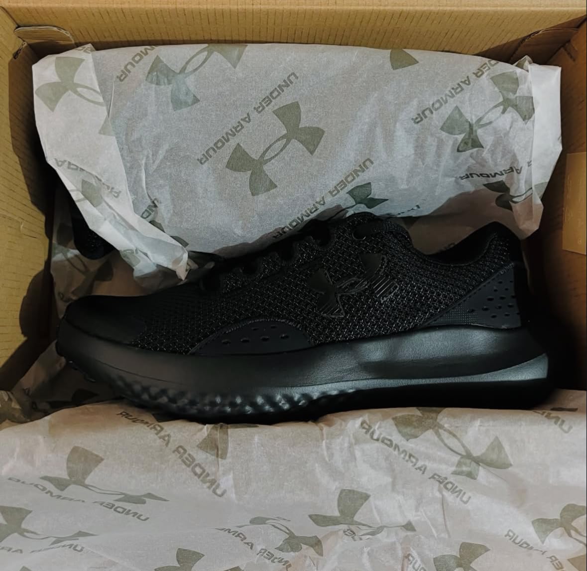 Under Armour Boys Surge 4 outsole traction pattern and rubber compound detail