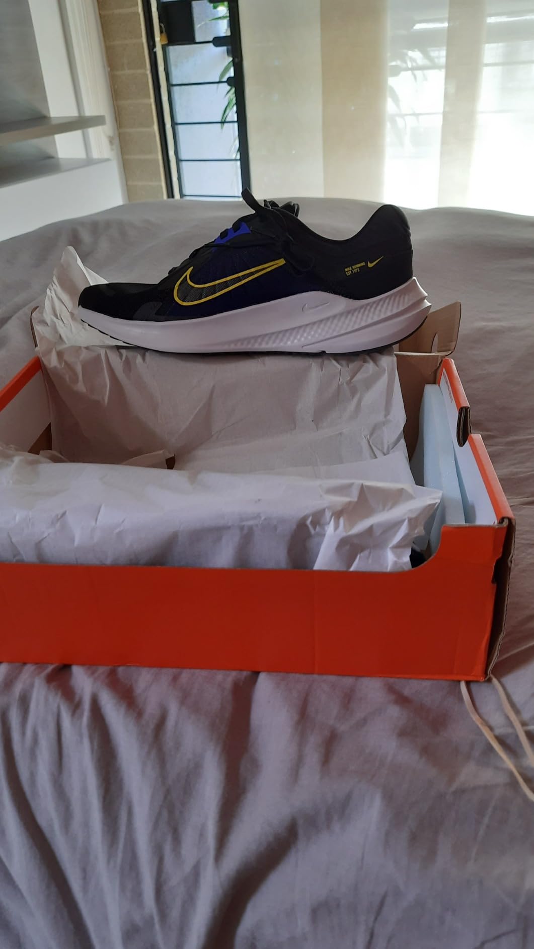 Nike Men's Sneaker side profile highlighting the supersoft foam midsole and rubber outsole pattern