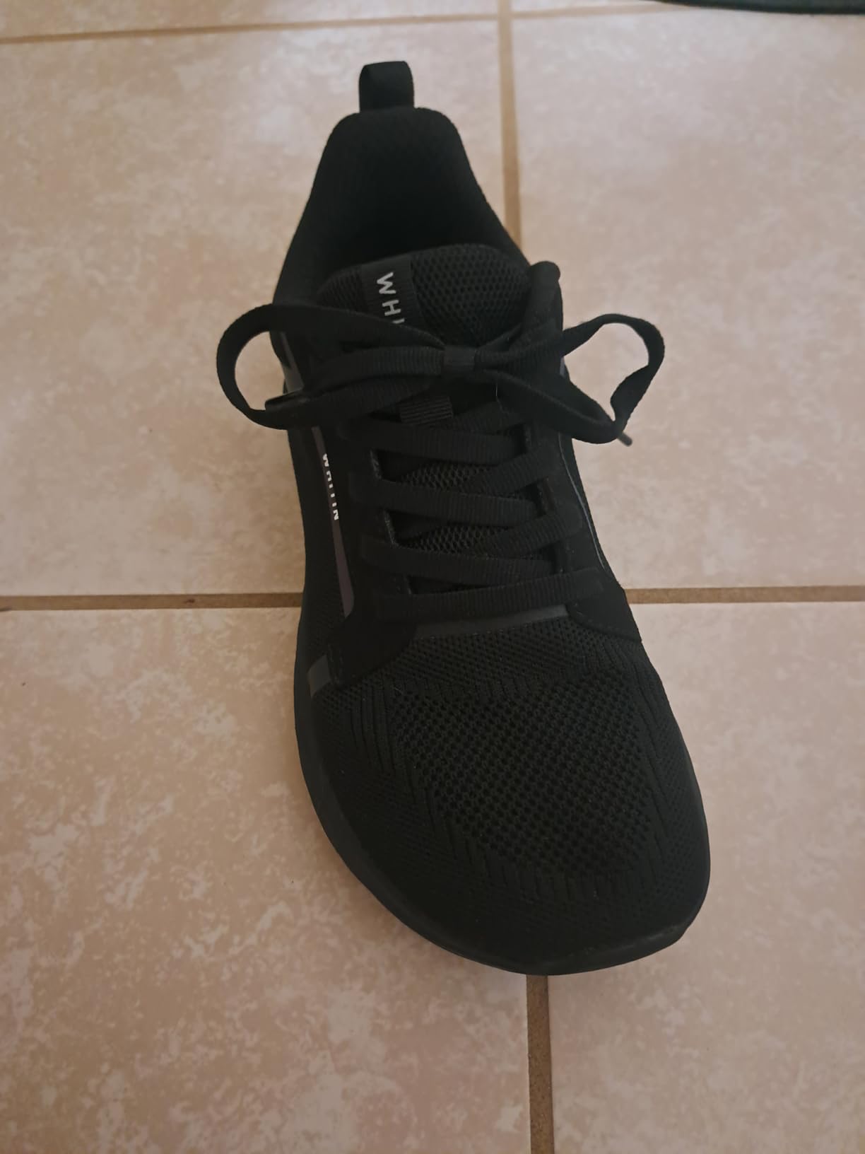 WHITIN shoe sole showing zero drop profile and rubber outsole pattern