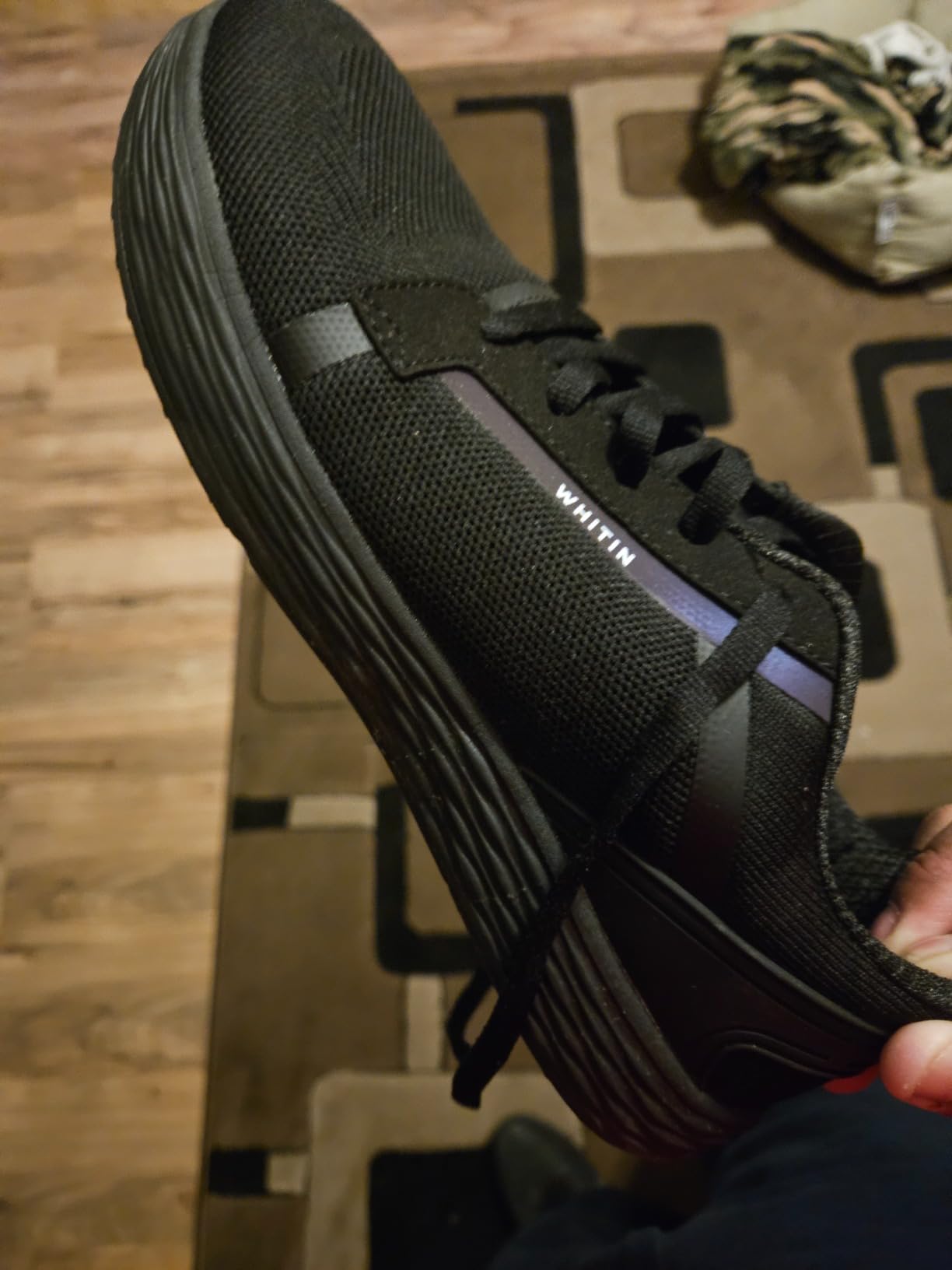 WHITIN shoes during gym workout showing sole flexibility and support