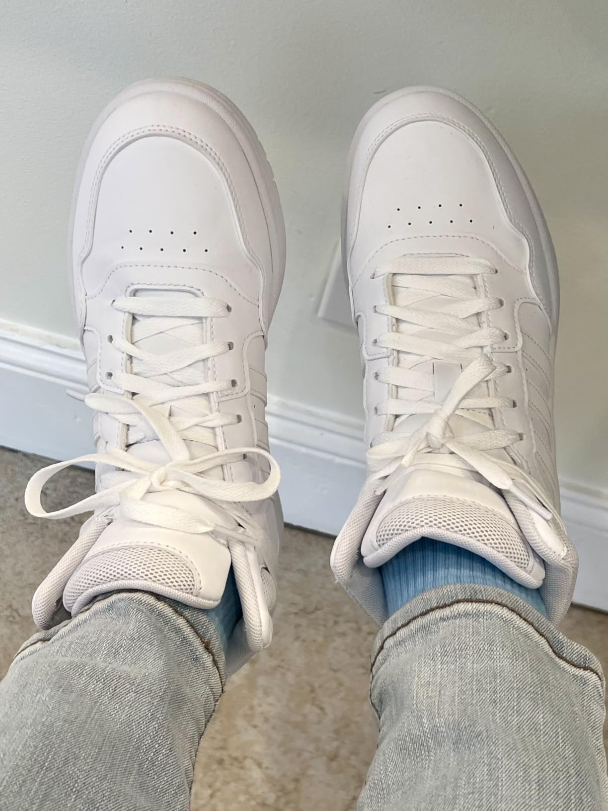 Adidas Women's Hoops 3.0 Mid basketball shoes white colorway showing classic mid-cut design