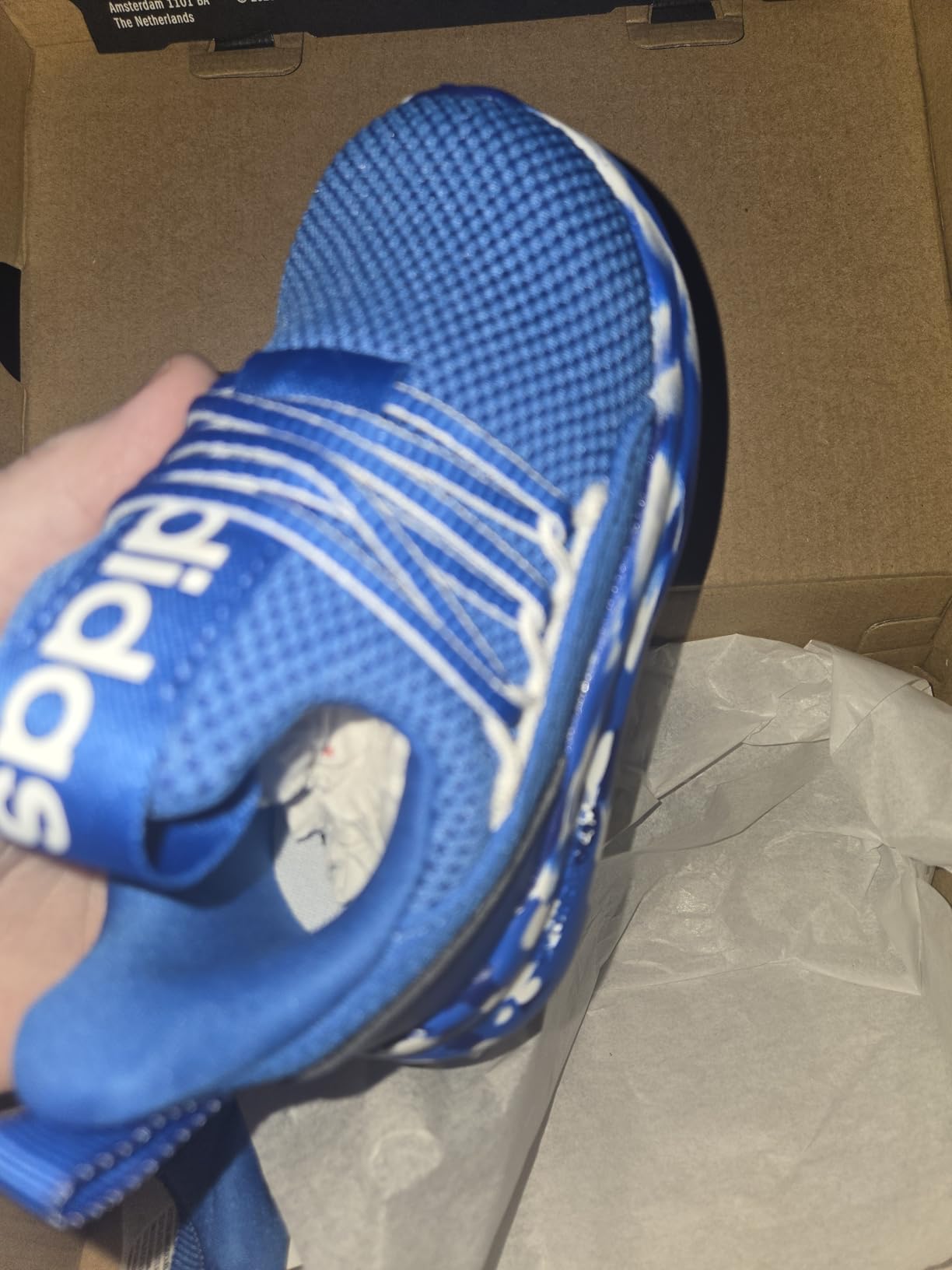 Adidas Lite Racer Adapt colorway showing stretchy upper material and elastic lacing system