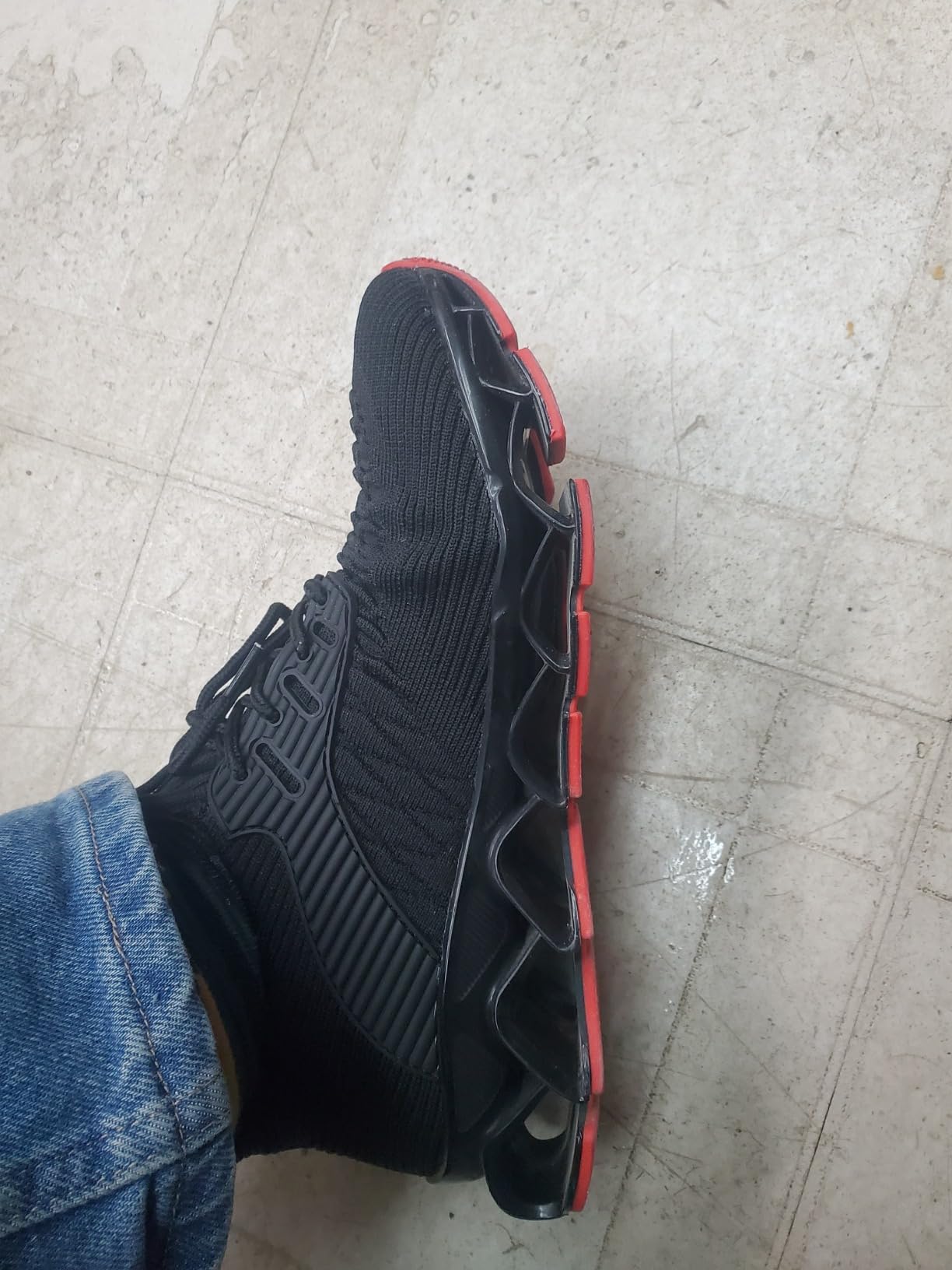 Side comparison view showing the lightweight construction and profile of the slip-on sneakers