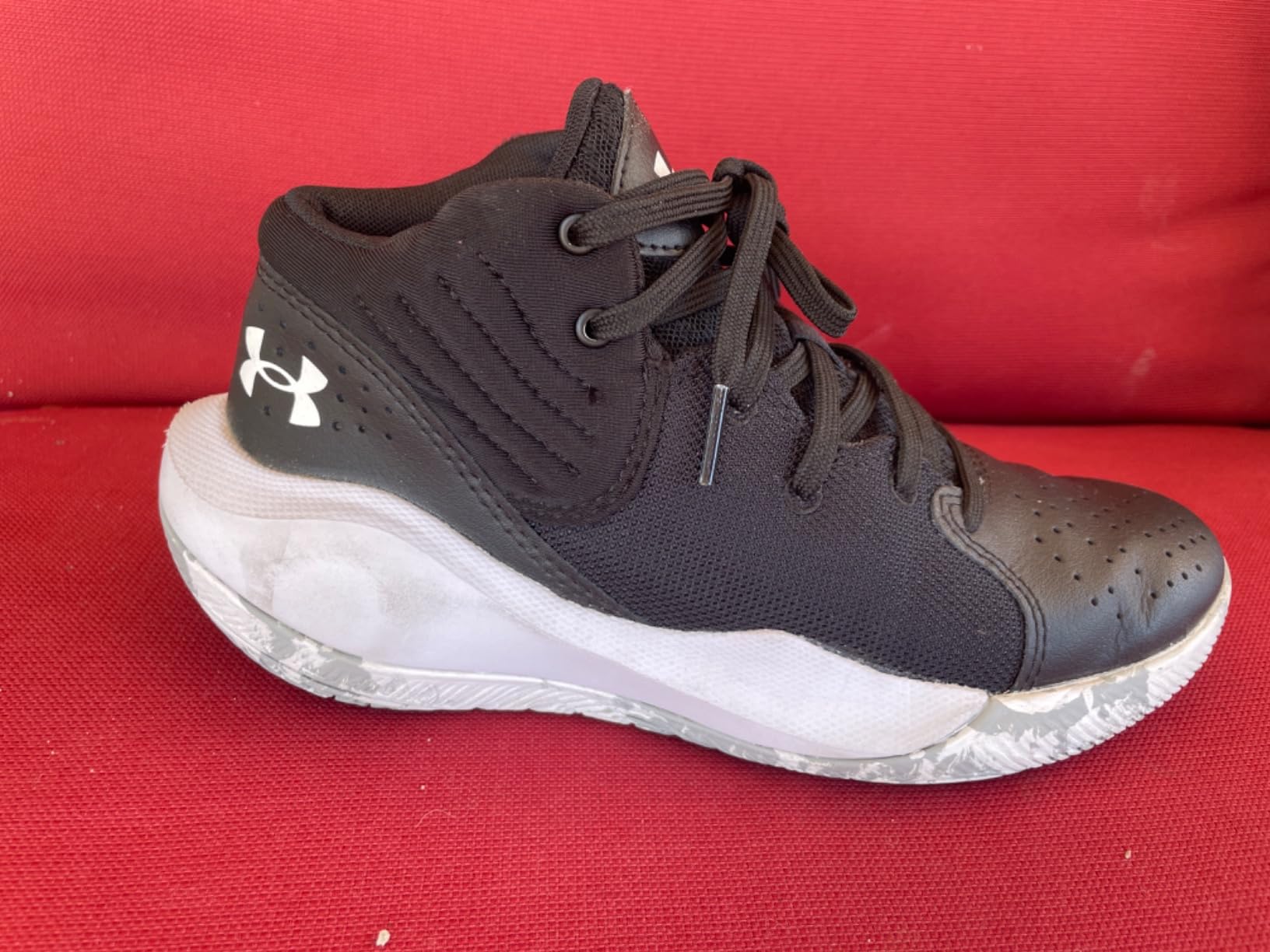 Under Armour Grade School Jet 21 basketball shoe sole pattern showing traction design for court grip