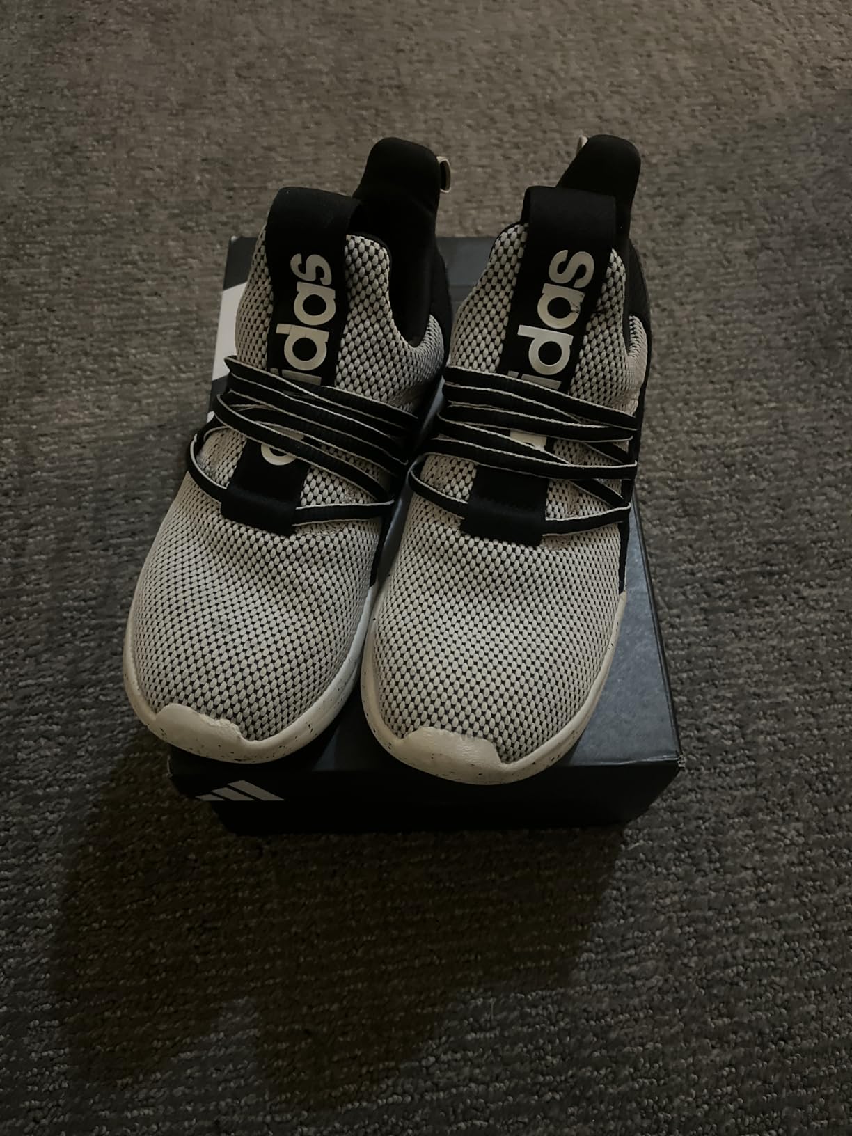Adidas Lite Racer after one month of daily school wear showing overall condition and durability