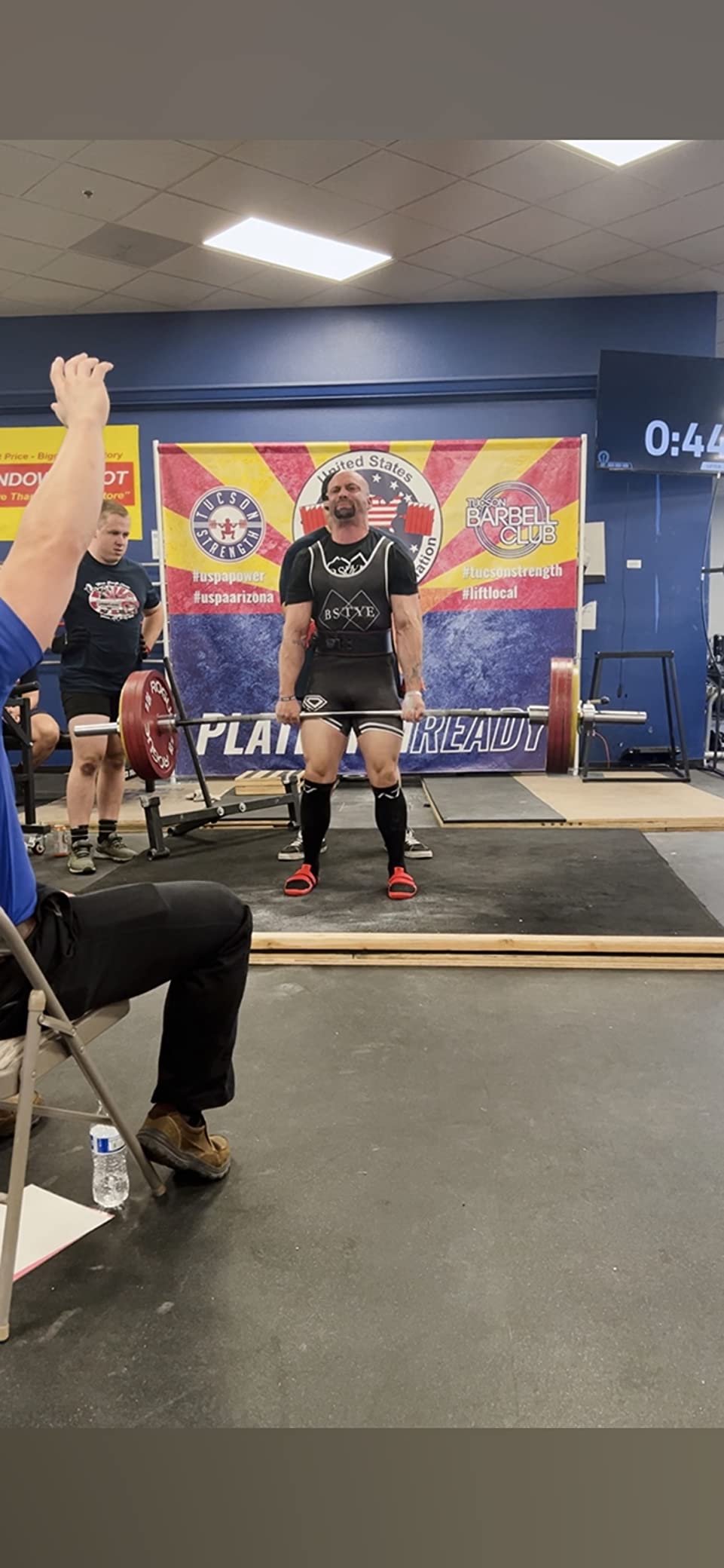 Deadlift shoes being worn during actual powerlifting session showing proper fit and performance