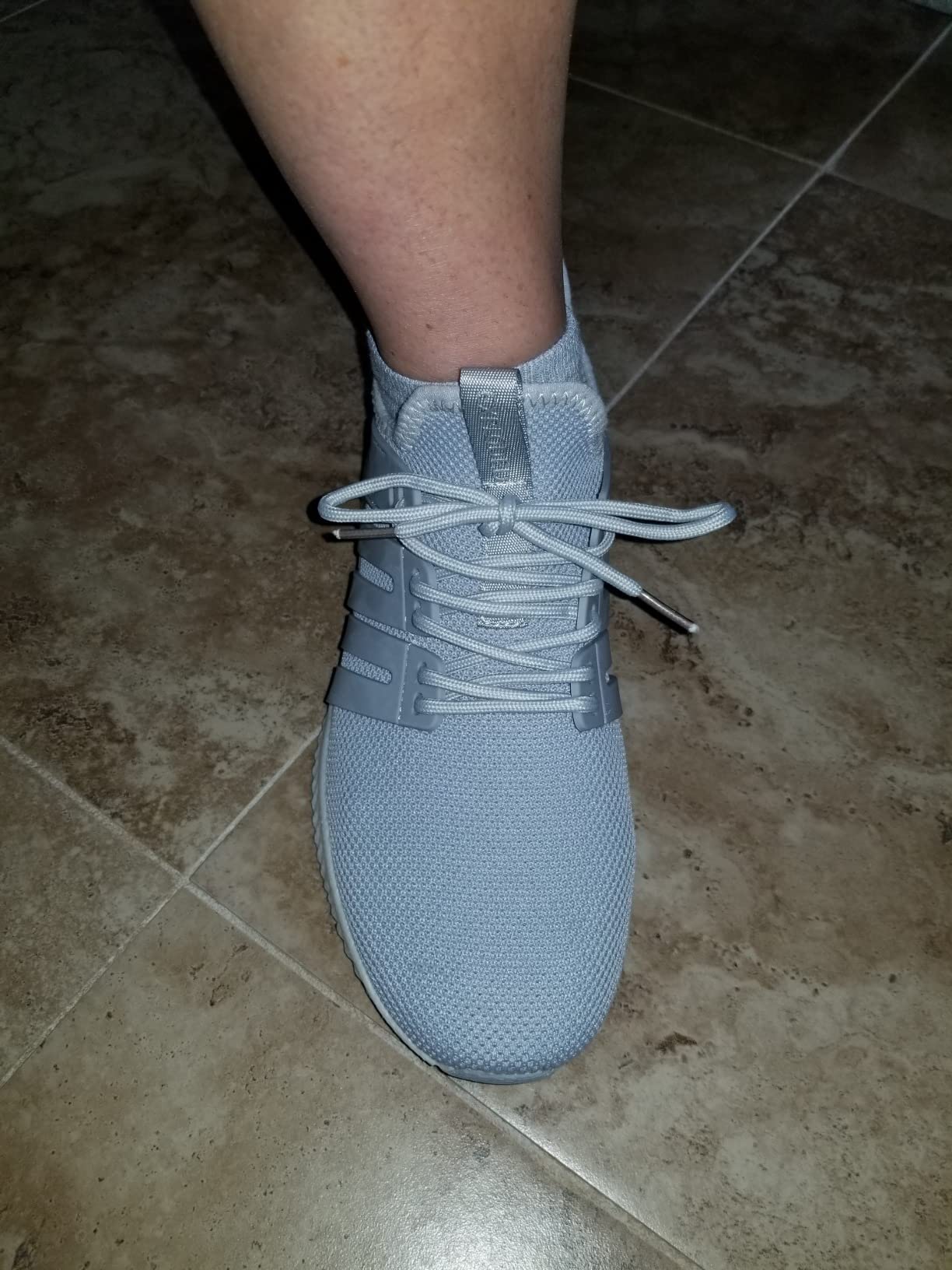 AKK sneakers action shot showing flexibility and movement during exercise