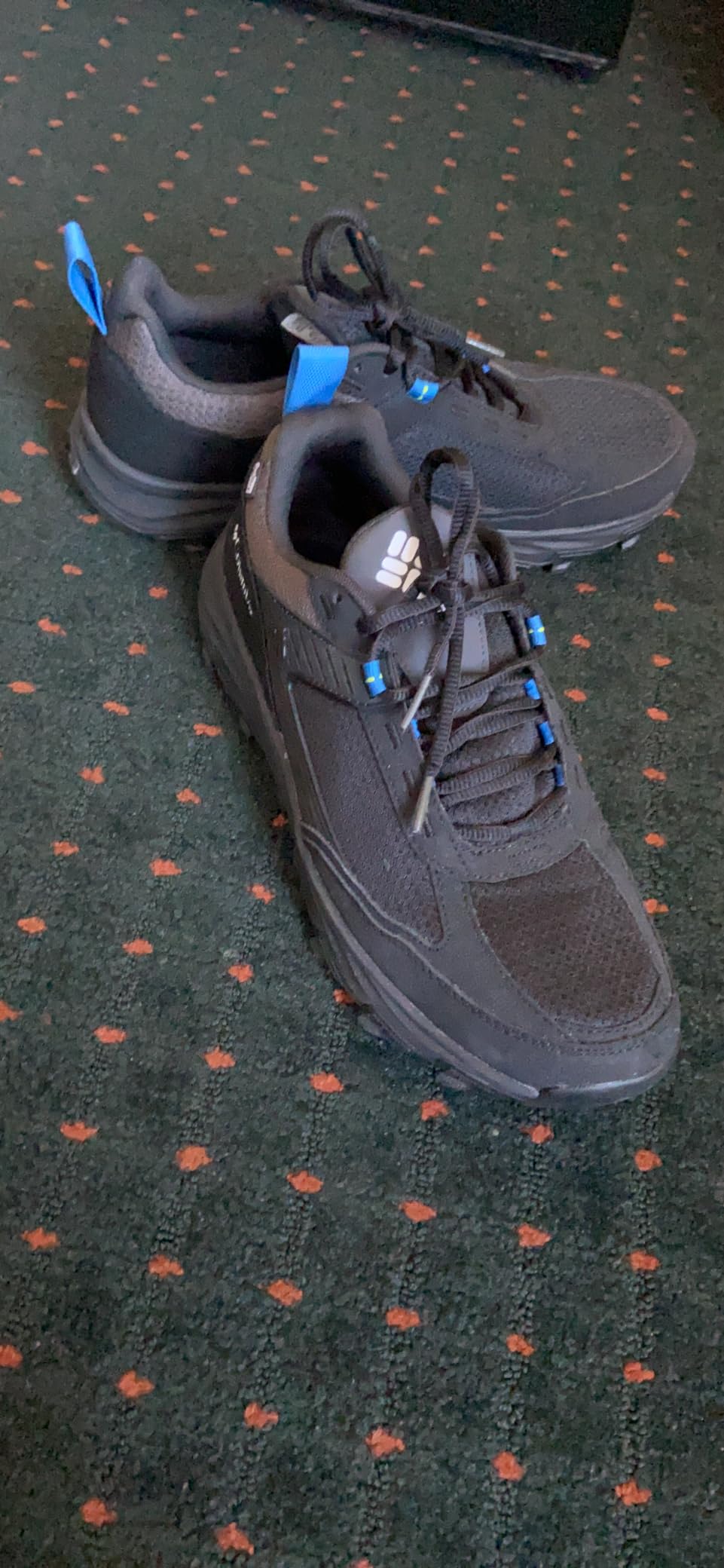 Columbia Hatana Max Outdry in action on rocky trail showing performance in natural hiking environment