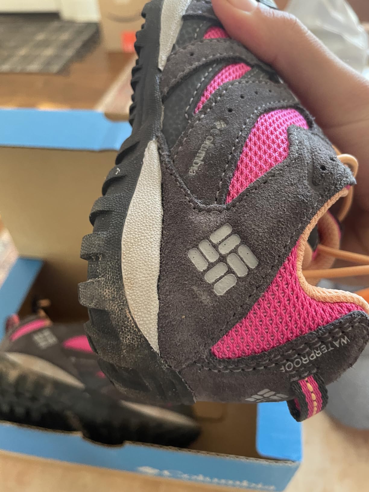 Columbia Redmond hiking shoes in action on outdoor trail showing real-world usage