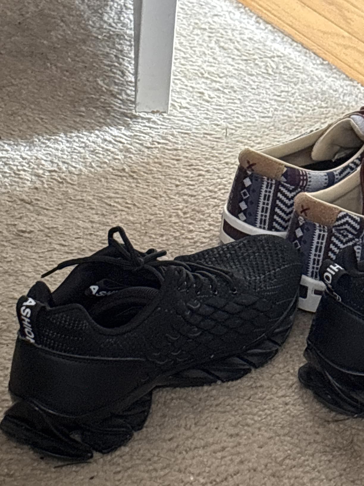 SKDOIUL athletic sneaker showing side construction and design elements during outdoor testing