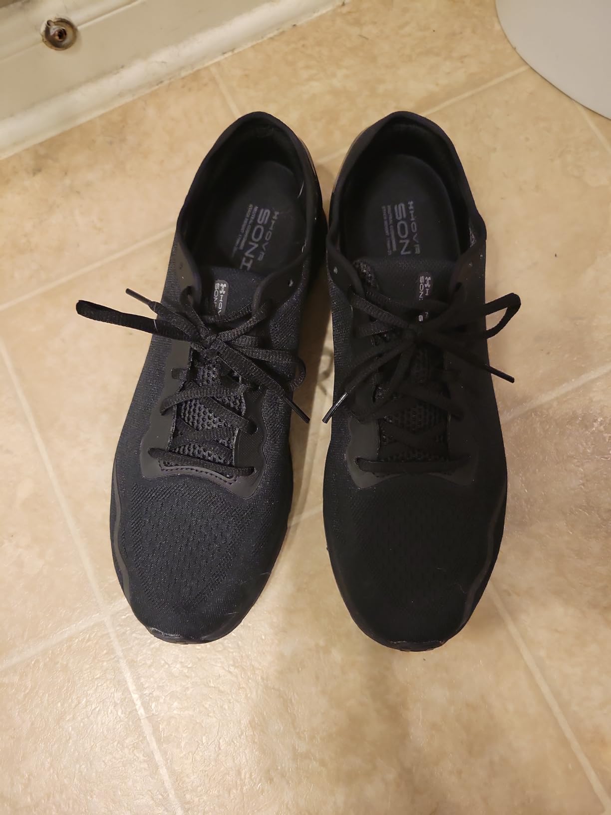 Under Armour HOVR Sonic 6 during road running test showing performance on asphalt surface