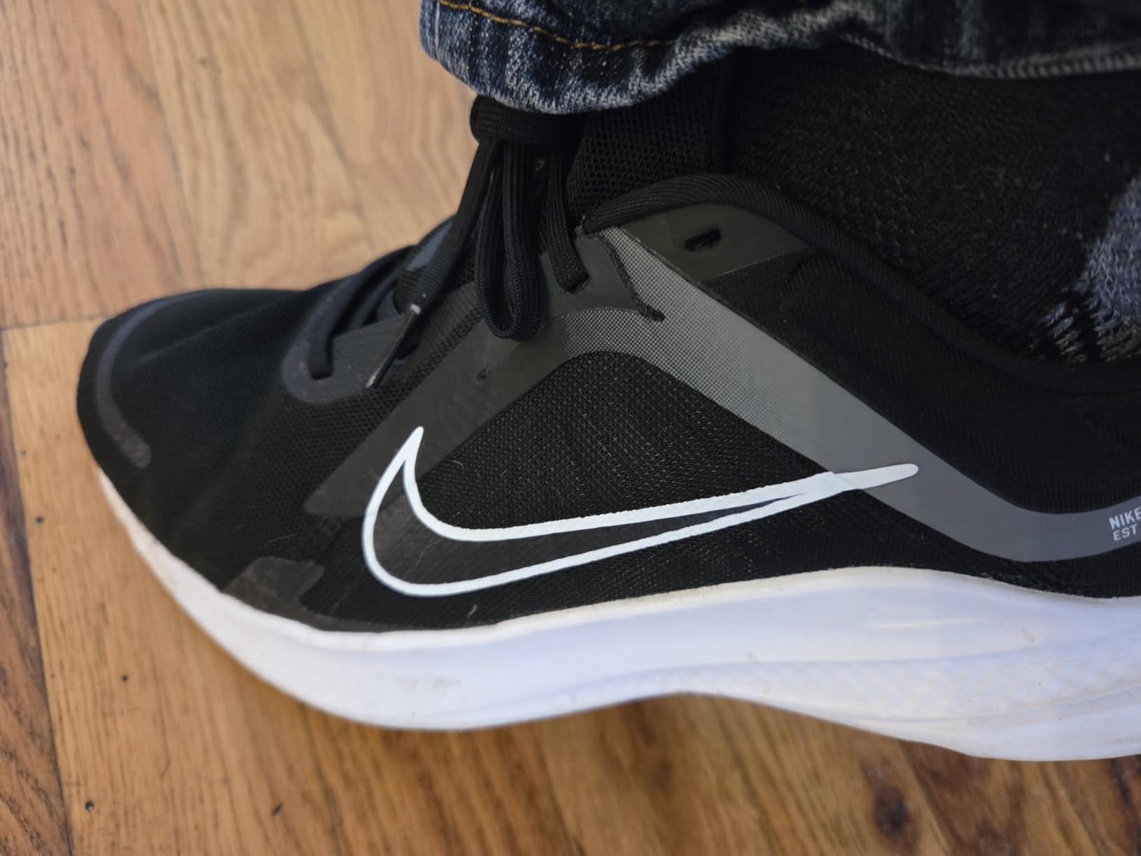 Nike Men's Sneaker detail showing mesh breathability and construction quality