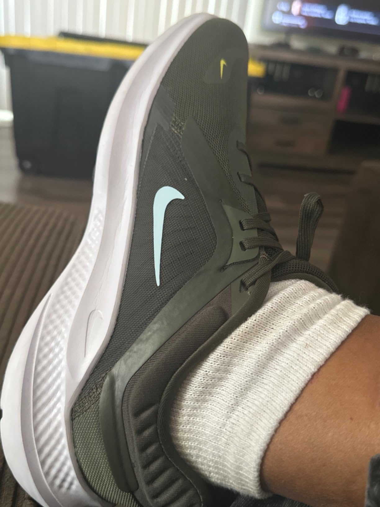 Nike Men's Sneaker on foot during running session showing fit and performance