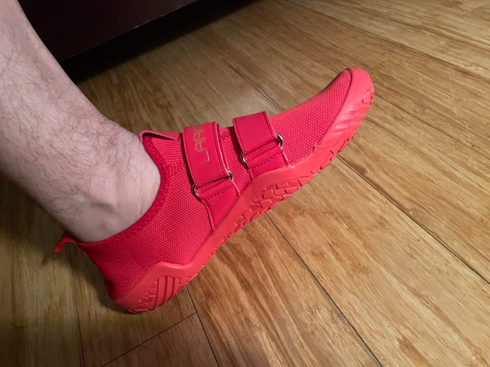Side profile showing completely flat sole design and low-profile construction ideal for powerlifting