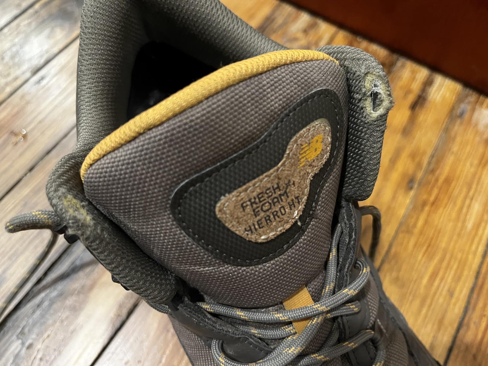 Trail wear pattern showing durability concerns with visible wear on upper material above laces after several months of use