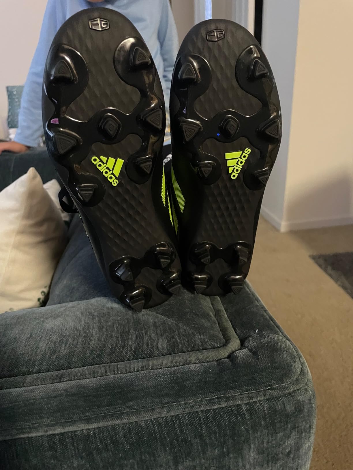 Adidas Goletto VII cleats on different field surfaces showing versatility