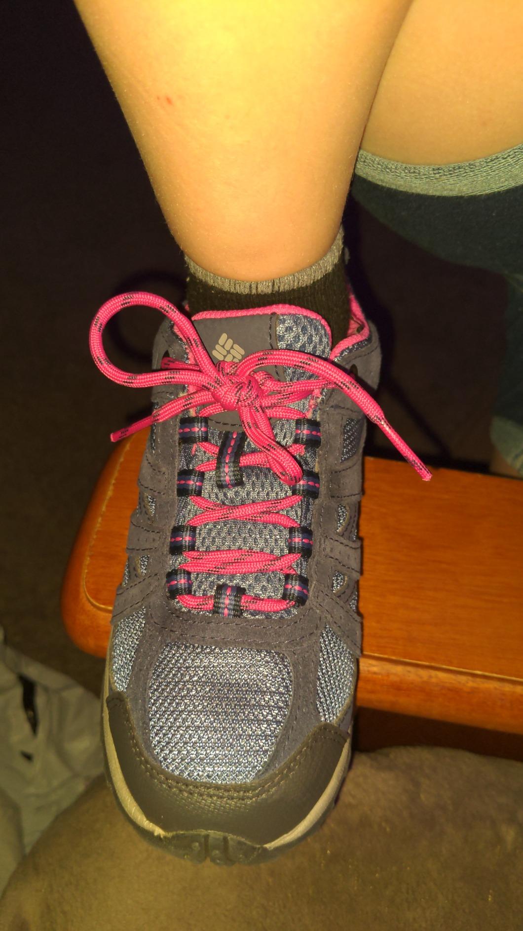 Columbia Redmond lacing system detail showing traditional laces vs advertised quick-lace system