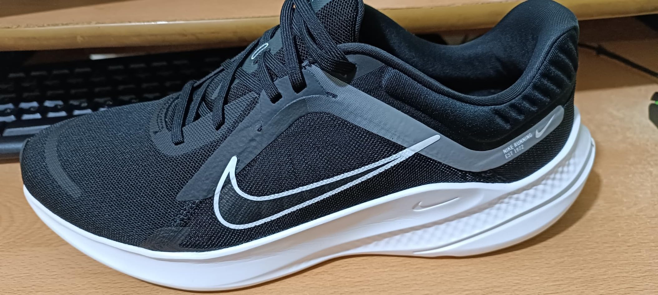 Nike Men's Sneaker showing wear pattern after extended testing period
