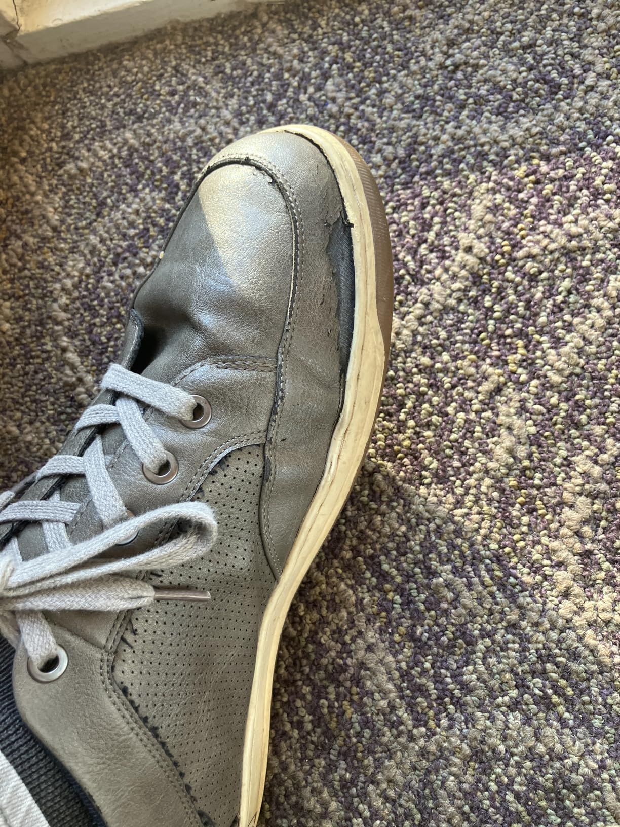 Examples of durability issues showing sole separation after several months of wear