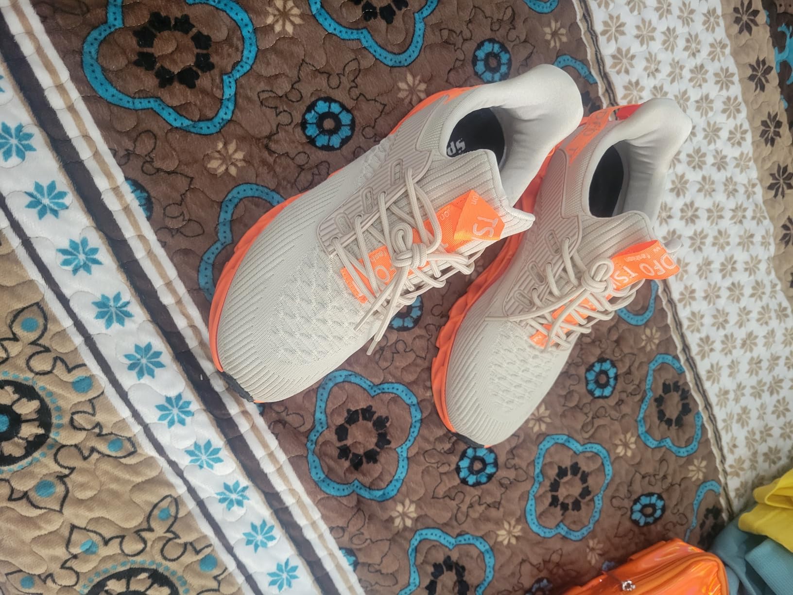 Side view of TSIODFO sneakers showing profile and athletic styling for walking activities