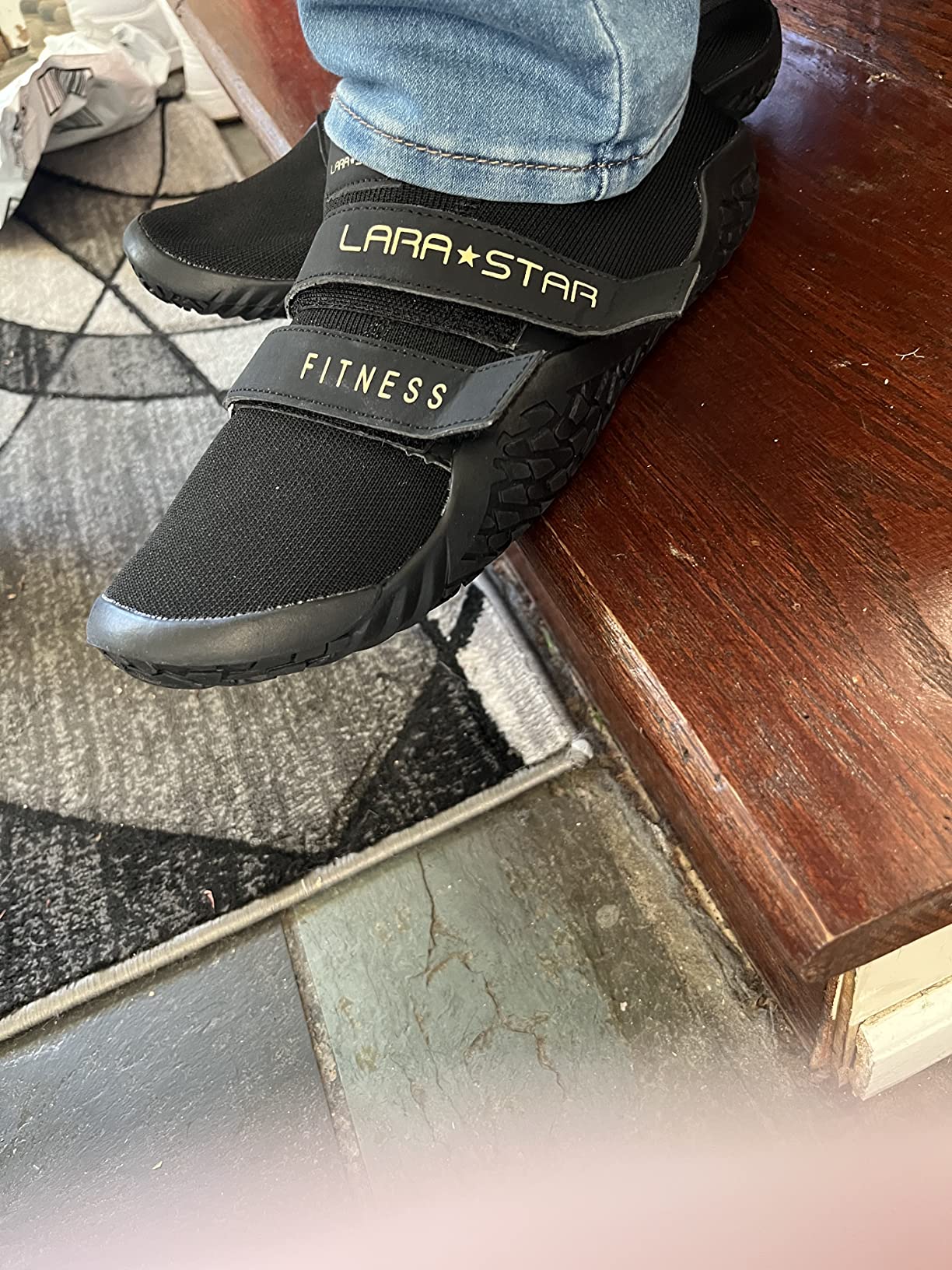Detailed view of velcro strap system and overall construction during gym use