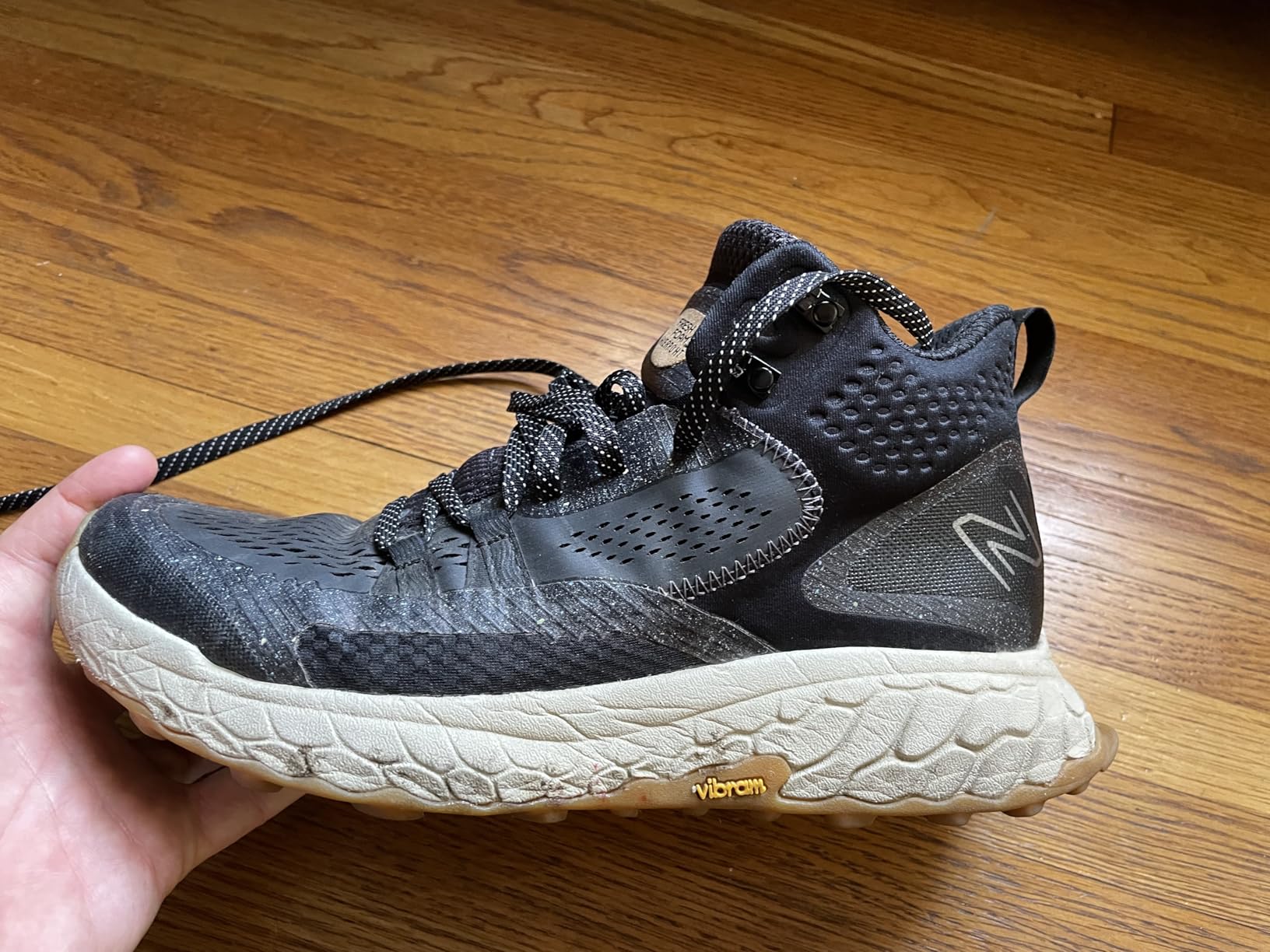 Vibram Megagrip outsole showing aggressive lug pattern and tread design for trail traction