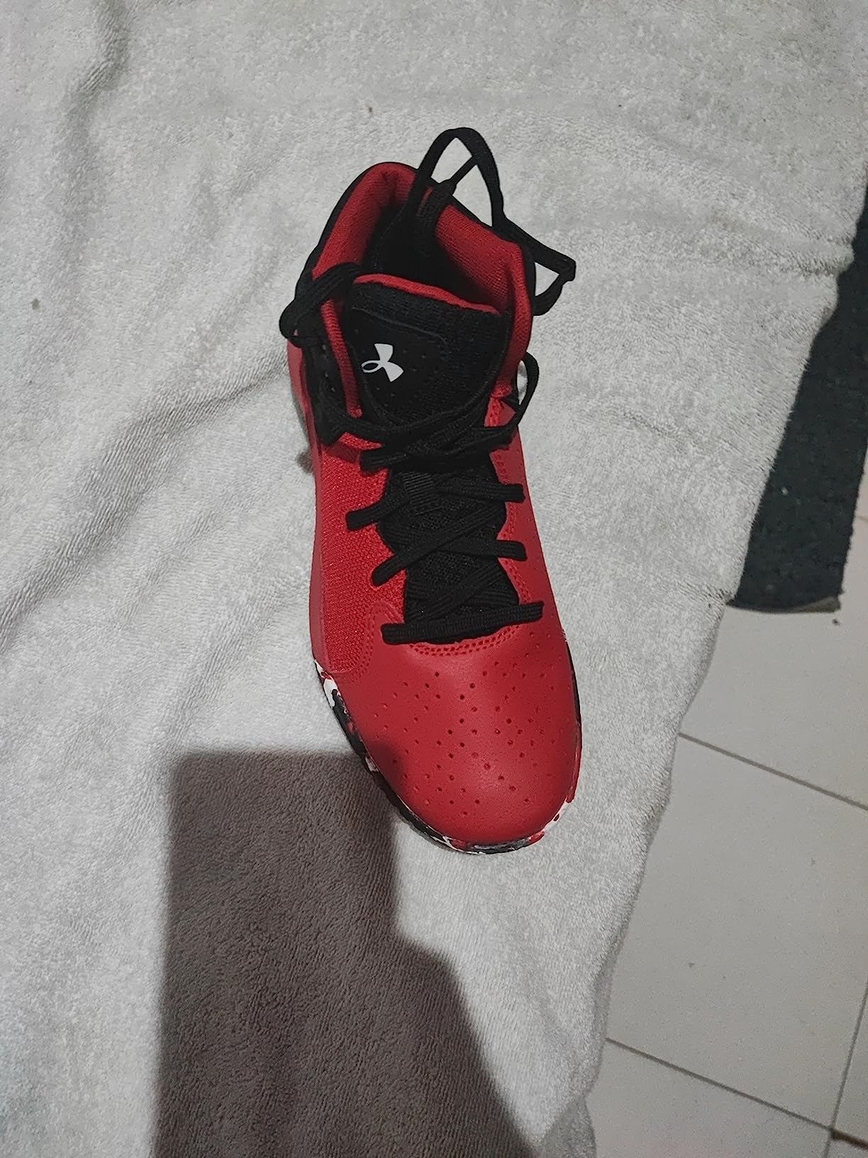 Under Armour Grade School basketball shoe detail showing wear patterns after testing period