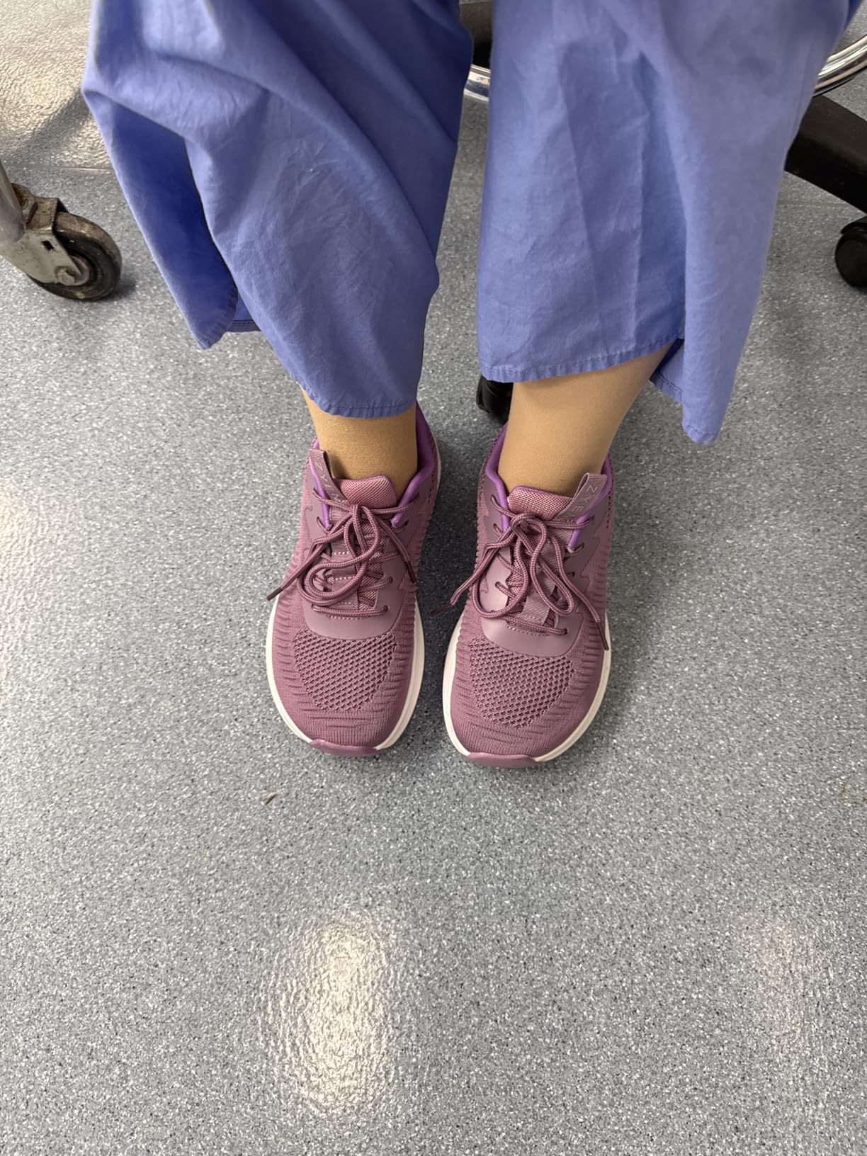ZYEN shoes being worn showing how they fit on feet and heel tab detail