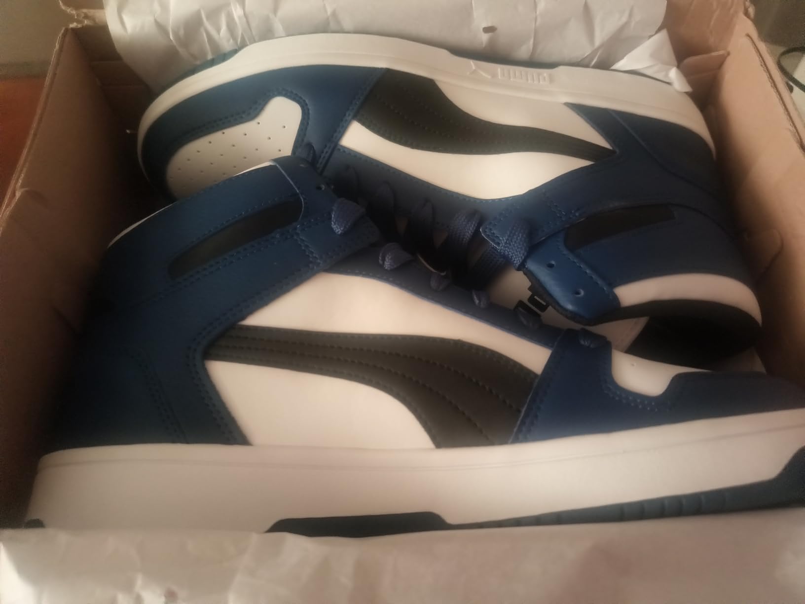 PUMA Rebound Layup upper construction detail showing synthetic leather and mesh panels