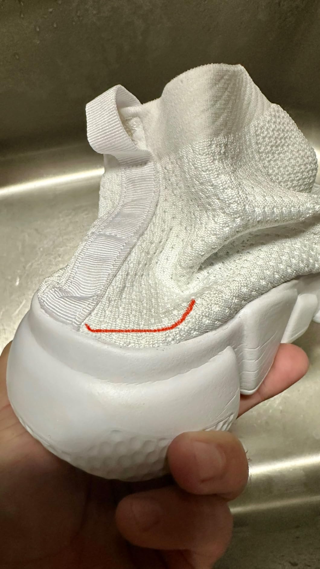 Bottom sole view of Santiro shoes showing MD sole pattern and flexibility