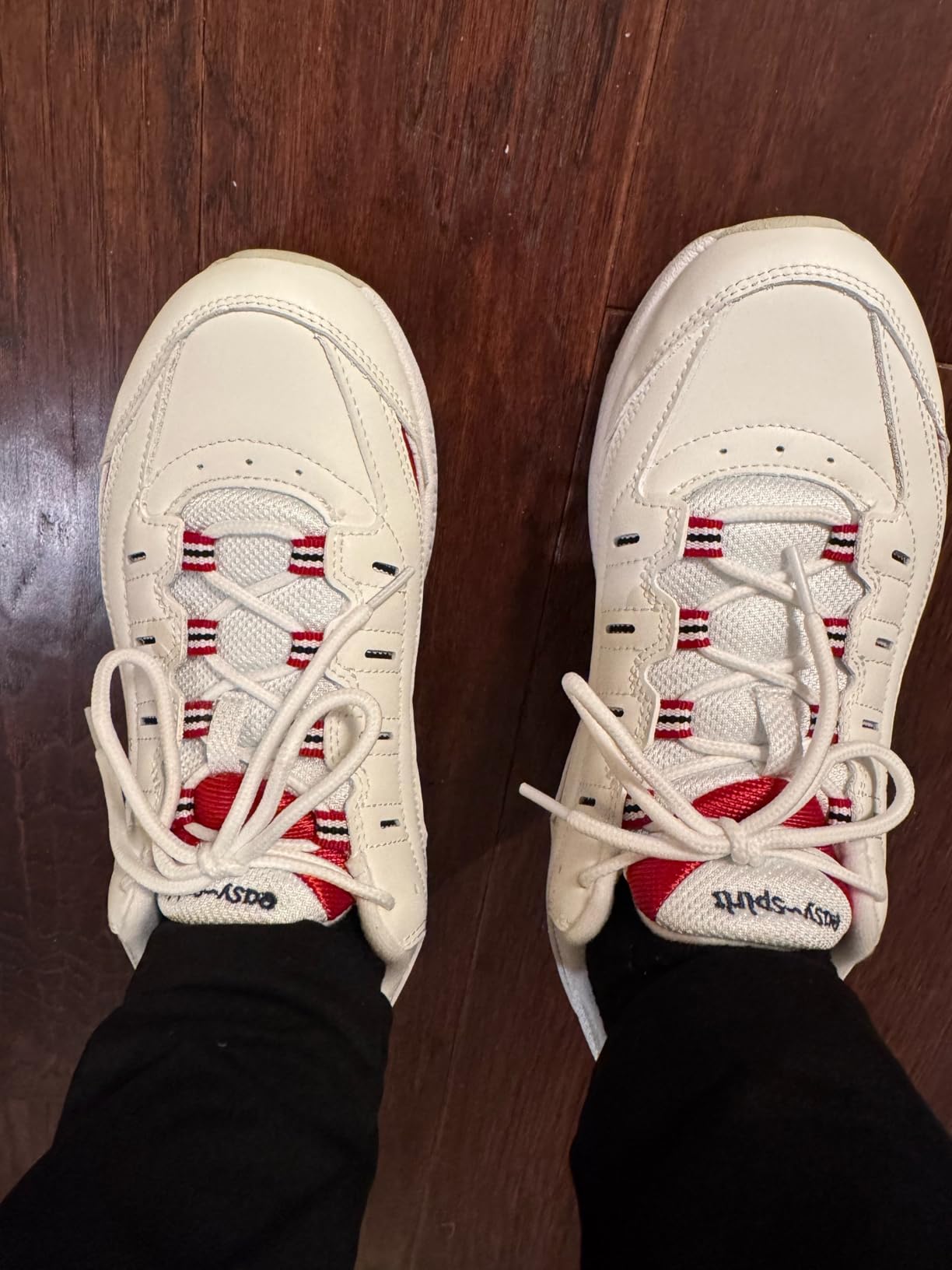 Easy Spirit Women's Romy Sneaker showing classic white leather design and supportive construction