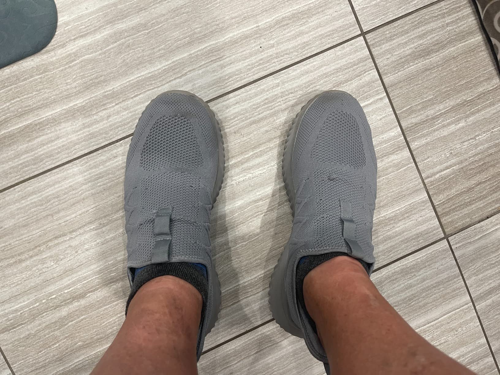 Testing shoes on different surfaces showing sole pattern and traction capabilities